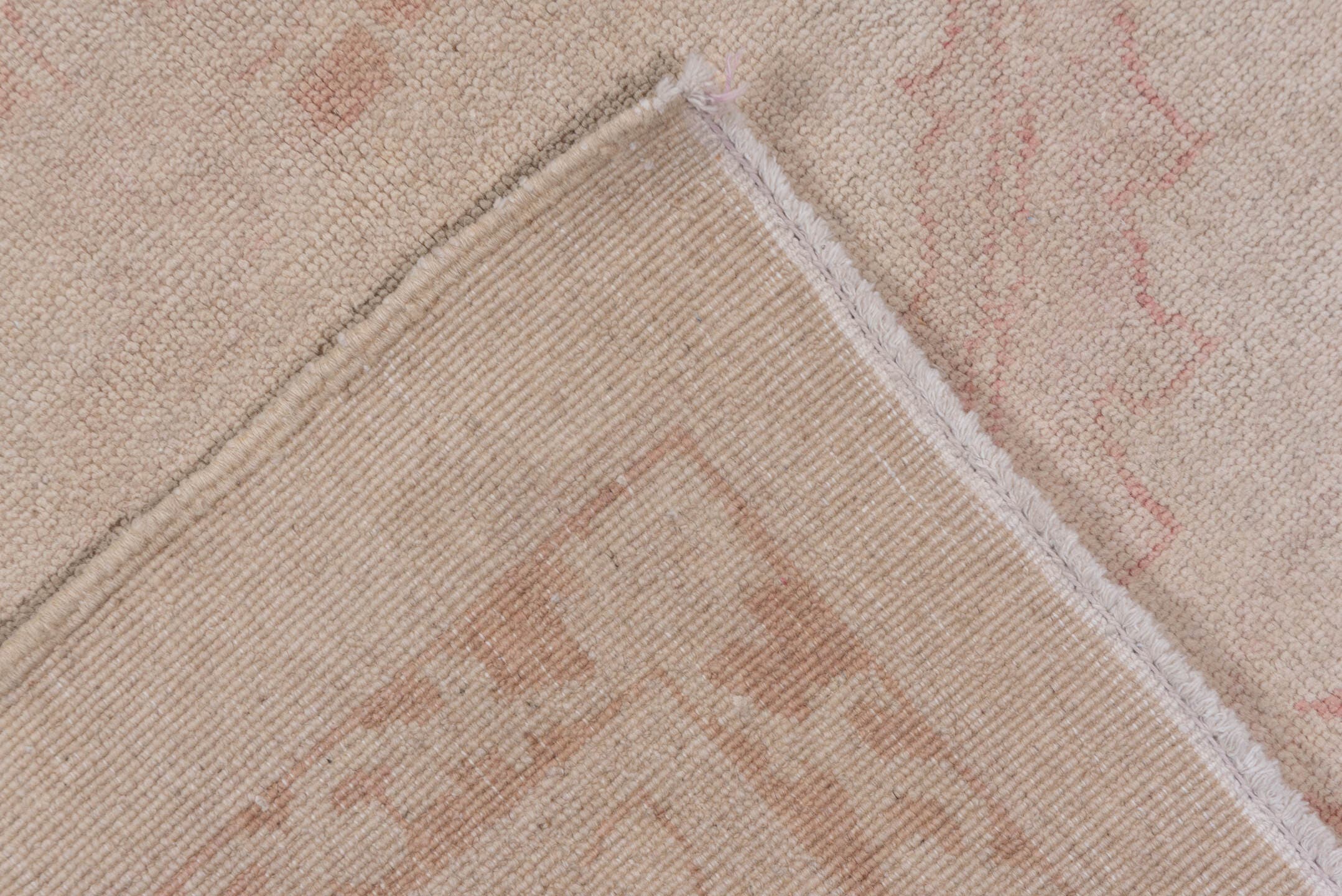 8' x 11' one-of-a-kind handmade vintage Afghan large size rug. Color palette: ivory, blush, cream, taupe, pale rose, pink