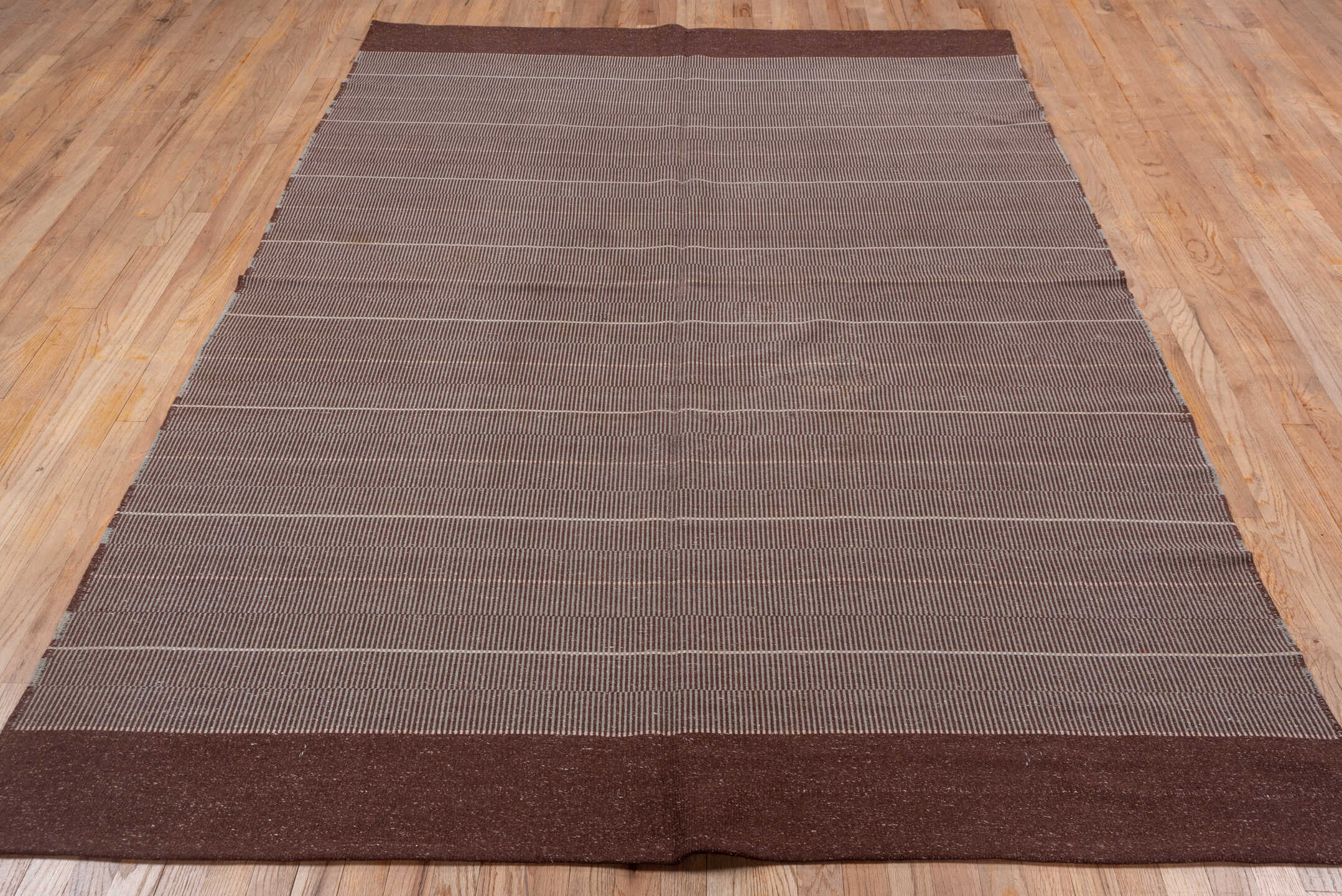 6' x 9' one-of-a-kind handmade vintage Flatweave medium size rug. Color palette: brown, gray, light gray, off-white, pink