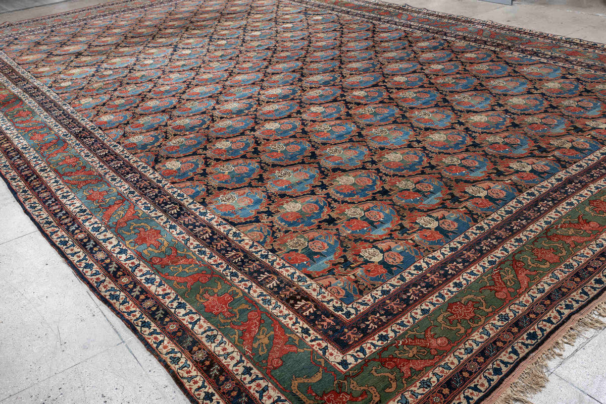 13' x 21' one-of-a-kind handmade vintage Bidjar oversize rug. Color palette: navy, sky blue, rust, ivory, sage, camel, blue