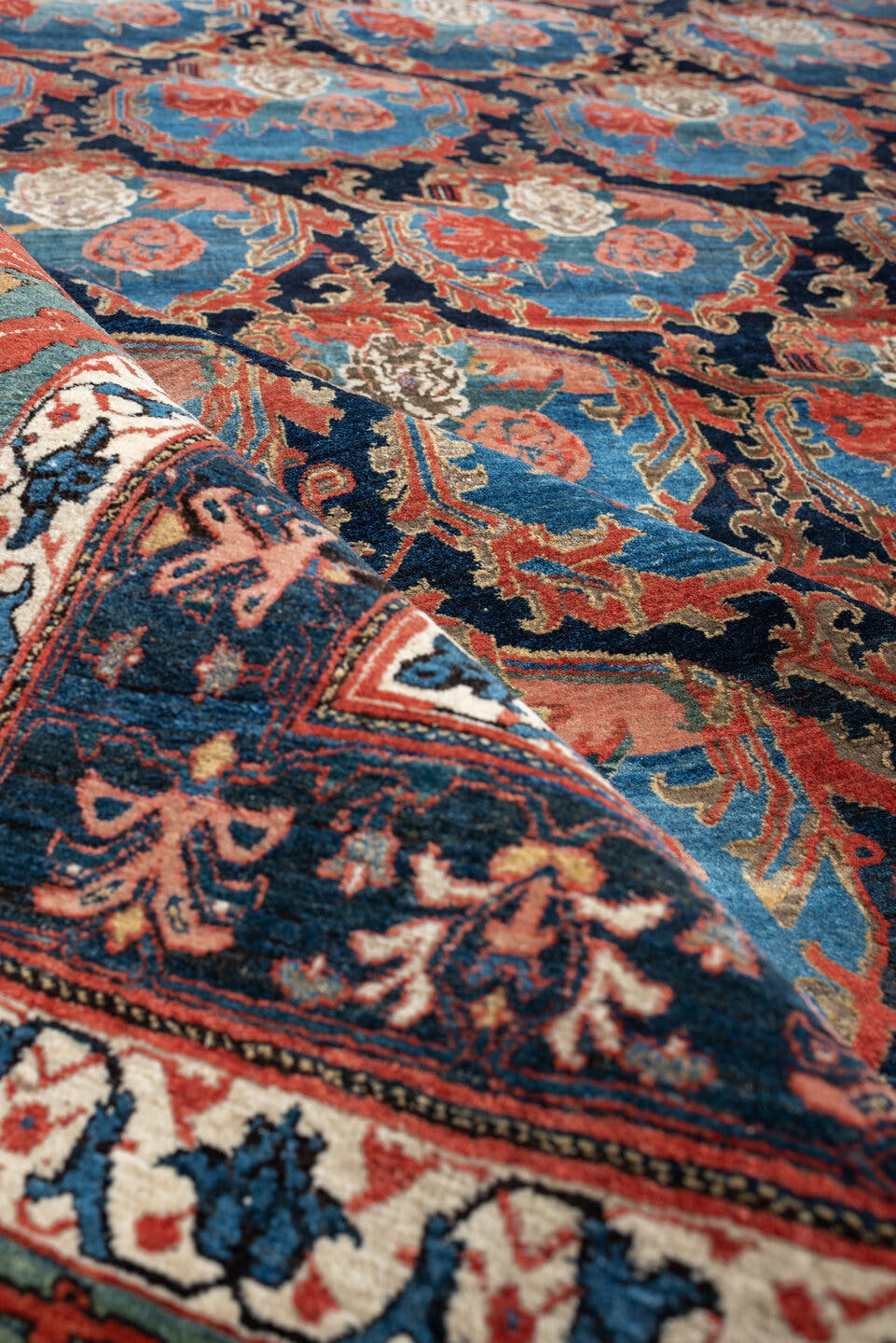13' x 21' one-of-a-kind handmade vintage Bidjar oversize rug. Color palette: navy, sky blue, rust, ivory, sage, camel, blue