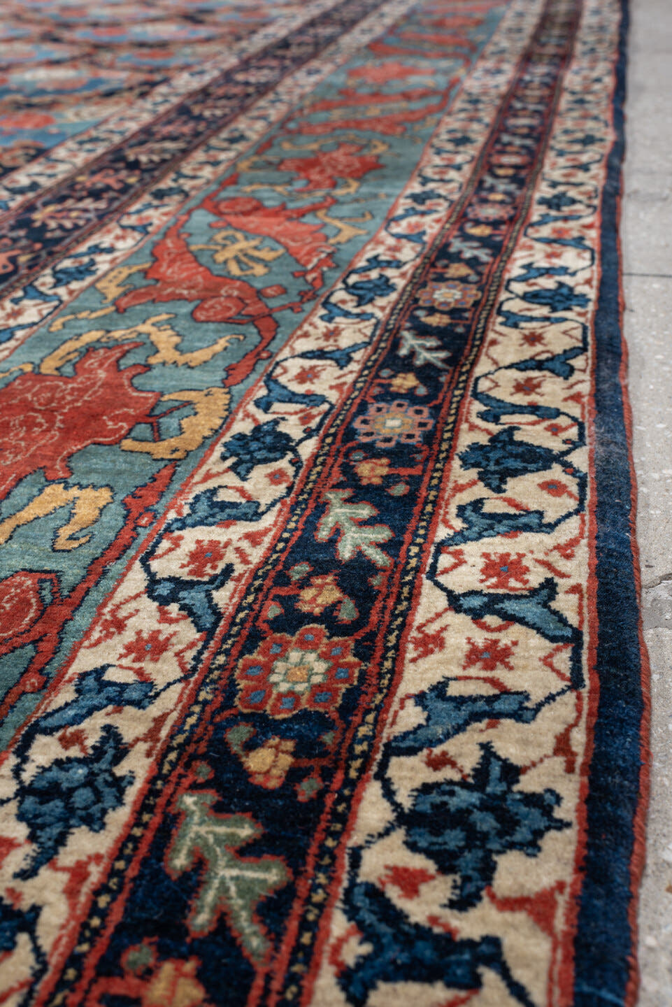 13' x 21' one-of-a-kind handmade vintage Bidjar oversize rug. Color palette: navy, sky blue, rust, ivory, sage, camel, blue