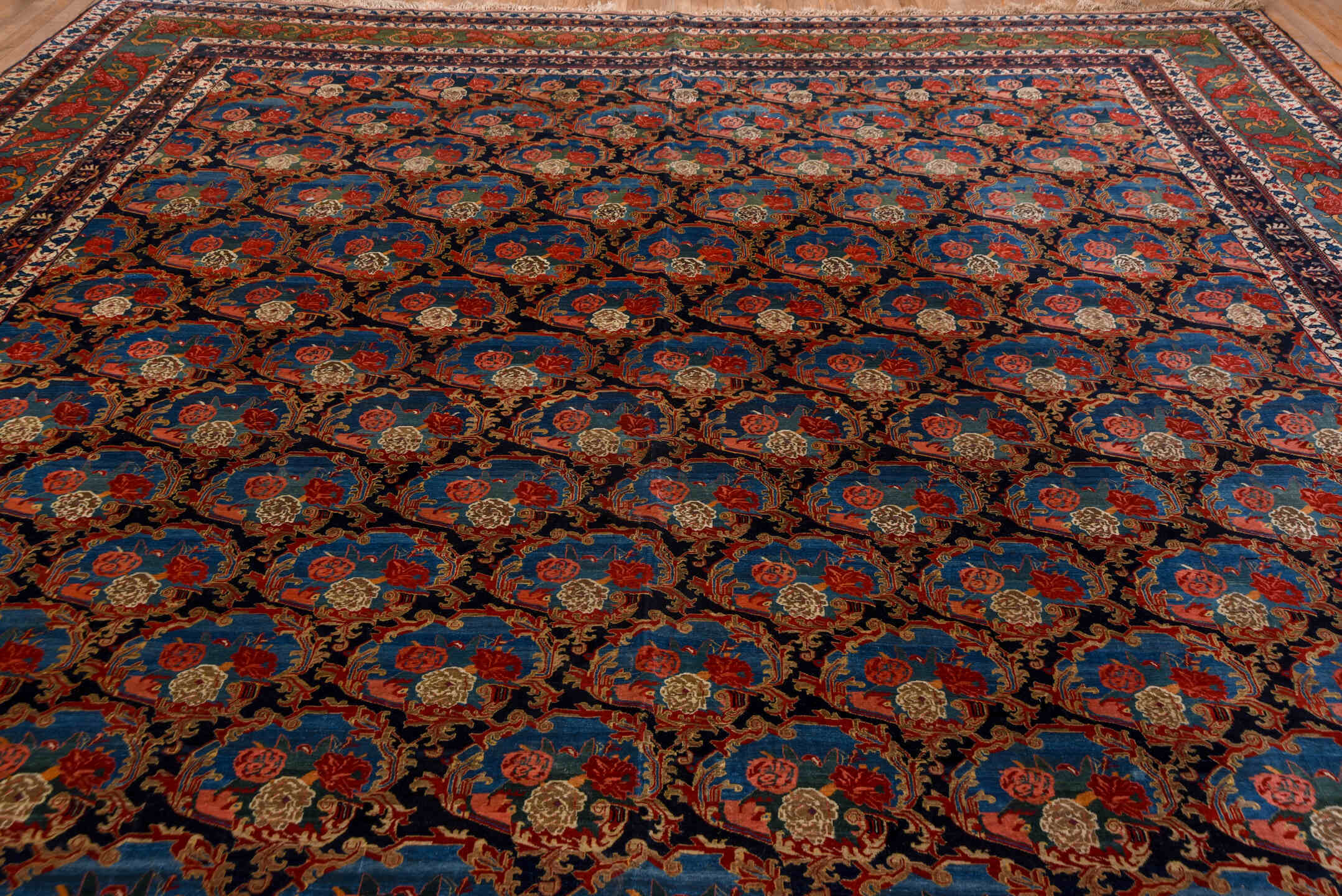 13' x 21' one-of-a-kind handmade vintage Bidjar oversize rug. Color palette: navy, sky blue, rust, ivory, sage, camel, blue