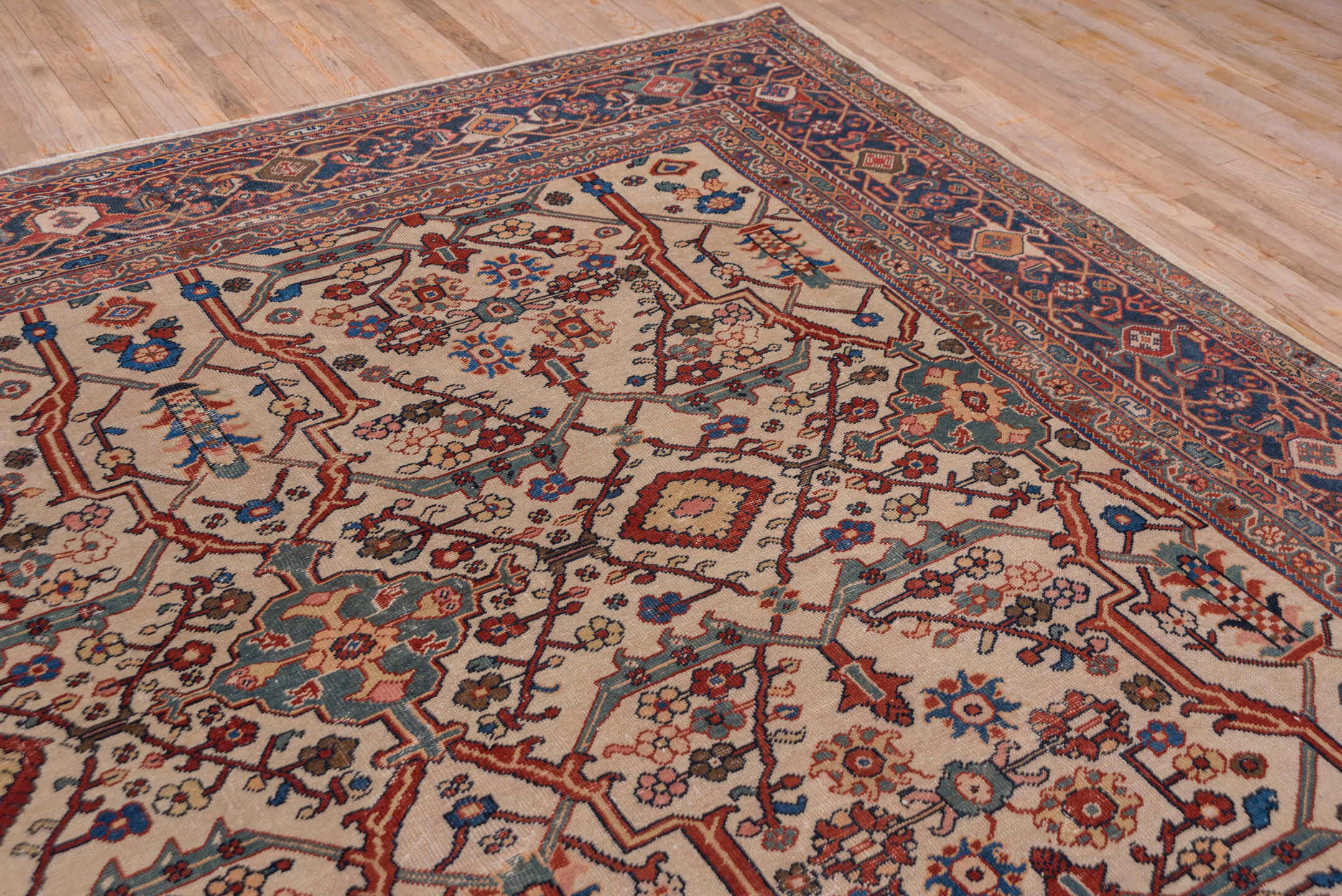 10' x 13' one-of-a-kind handmade antique Sultanabad large size rug. Color palette: ivory, navy, rust, soft blue, camel