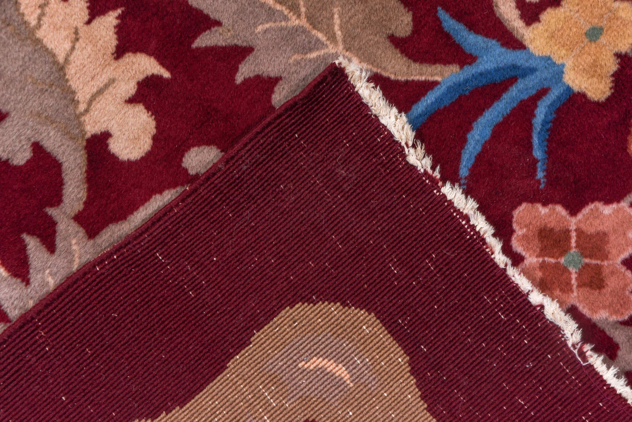 10' x 17' one-of-a-kind handmade antique Chinese rug. Color palette: burgundy, gold, ivory, blue, rose, taupe, pink, red