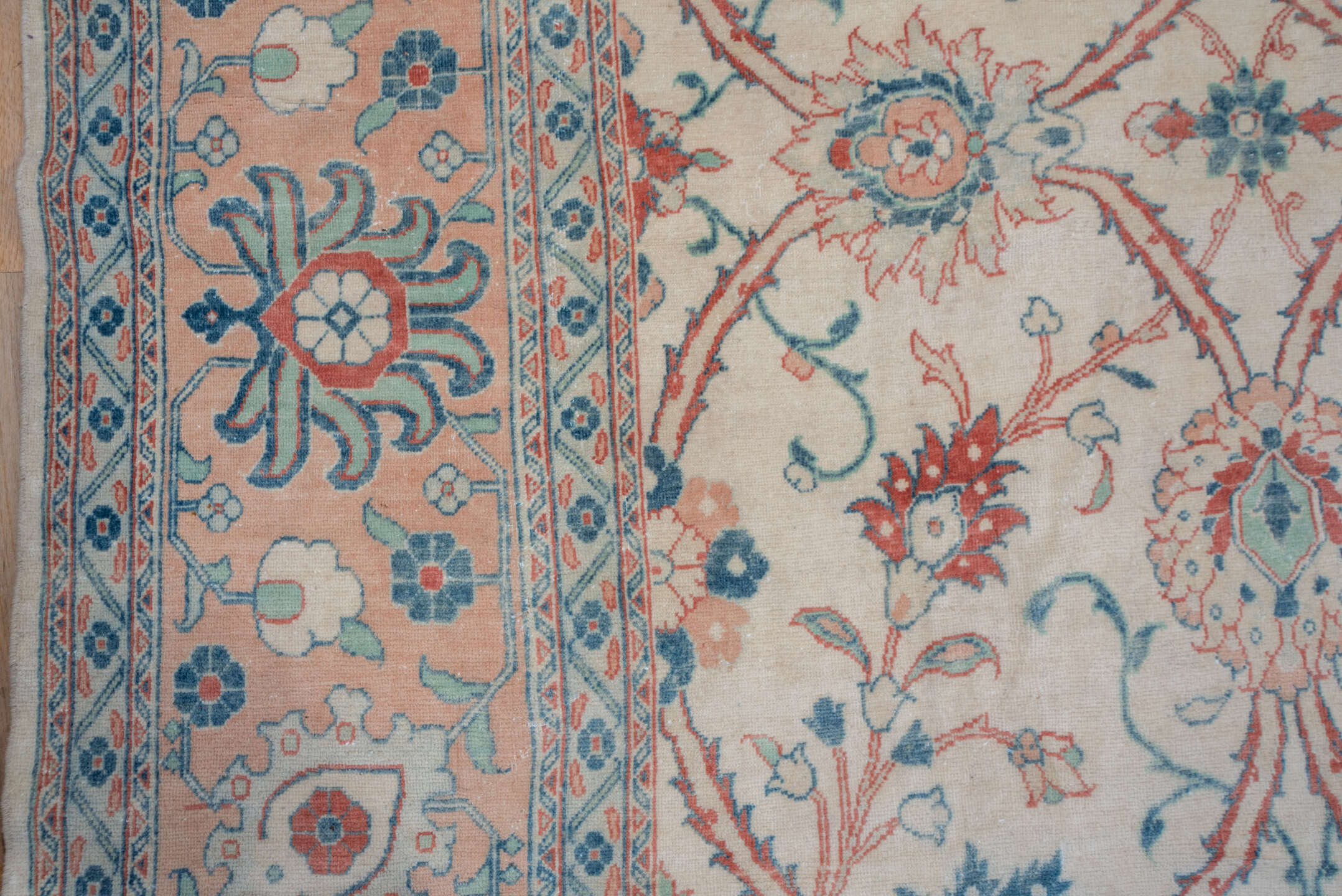 12' x 19' one-of-a-kind handmade vintage  oversize rug. Color palette: ivory, peach, sky blue, rust, sage, taupe, terracotta