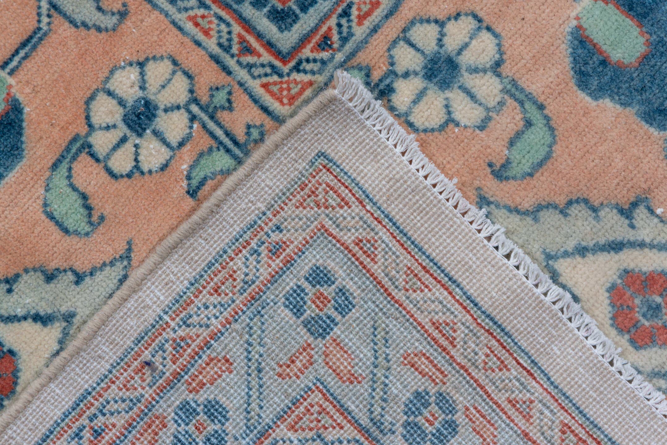 12' x 19' one-of-a-kind handmade vintage  oversize rug. Color palette: ivory, peach, sky blue, rust, sage, taupe, terracotta
