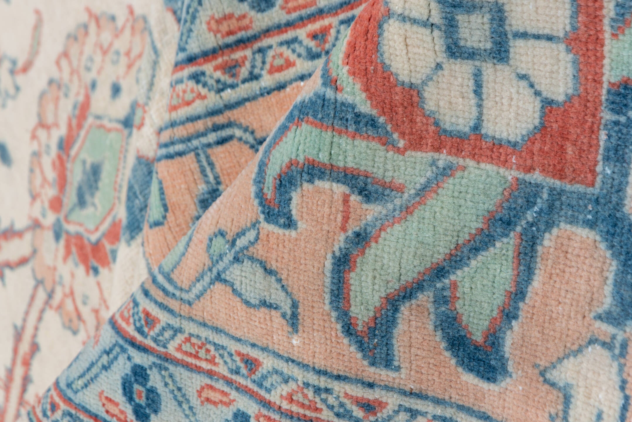 12' x 19' one-of-a-kind handmade vintage  oversize rug. Color palette: ivory, peach, sky blue, rust, sage, taupe, terracotta