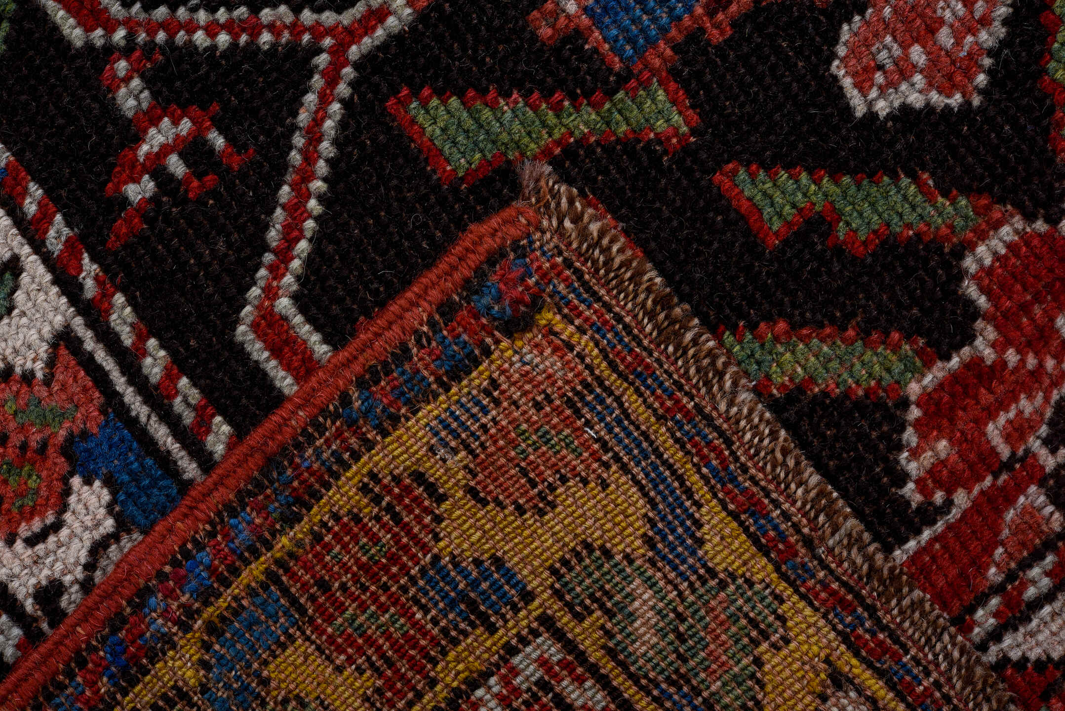 3' x 10' one-of-a-kind handmade vintage Karabagh runner rug. Color palette: black, crimson, ivory, gold, blue, rose, olive