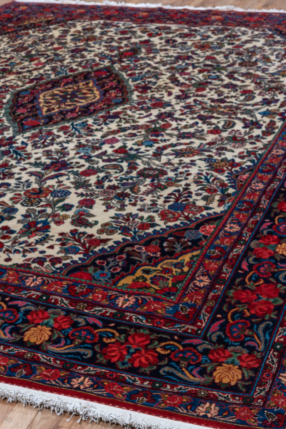 9' x 12' one-of-a-kind handmade vintage Bidjar large size rug. Color palette: ivory, navy, crimson, sky blue, rose, taupe