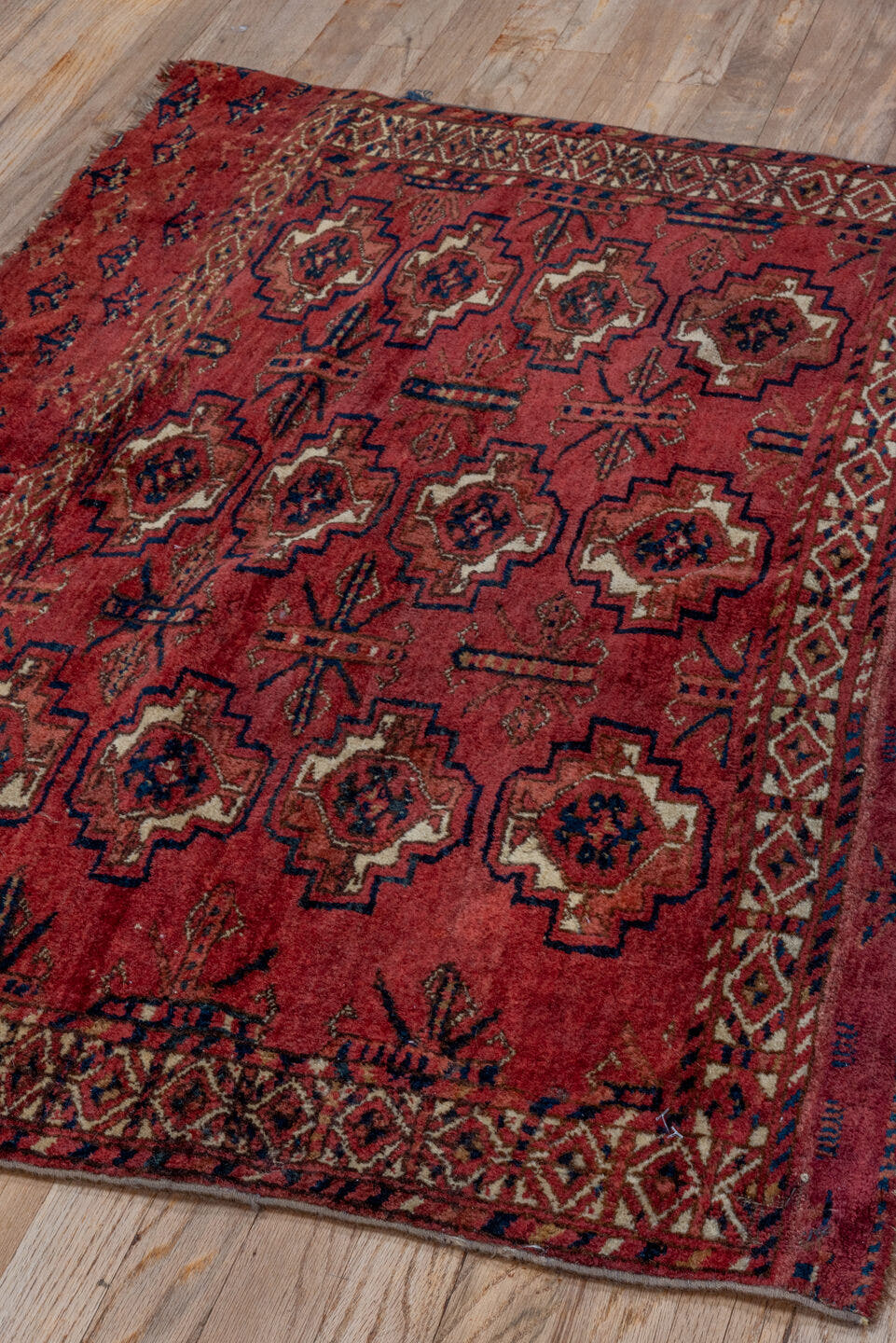 2' x 4' one-of-a-kind handmade vintage Torkaman small size rug. Color palette: red, burgundy, ivory, brown, charcoal, rust