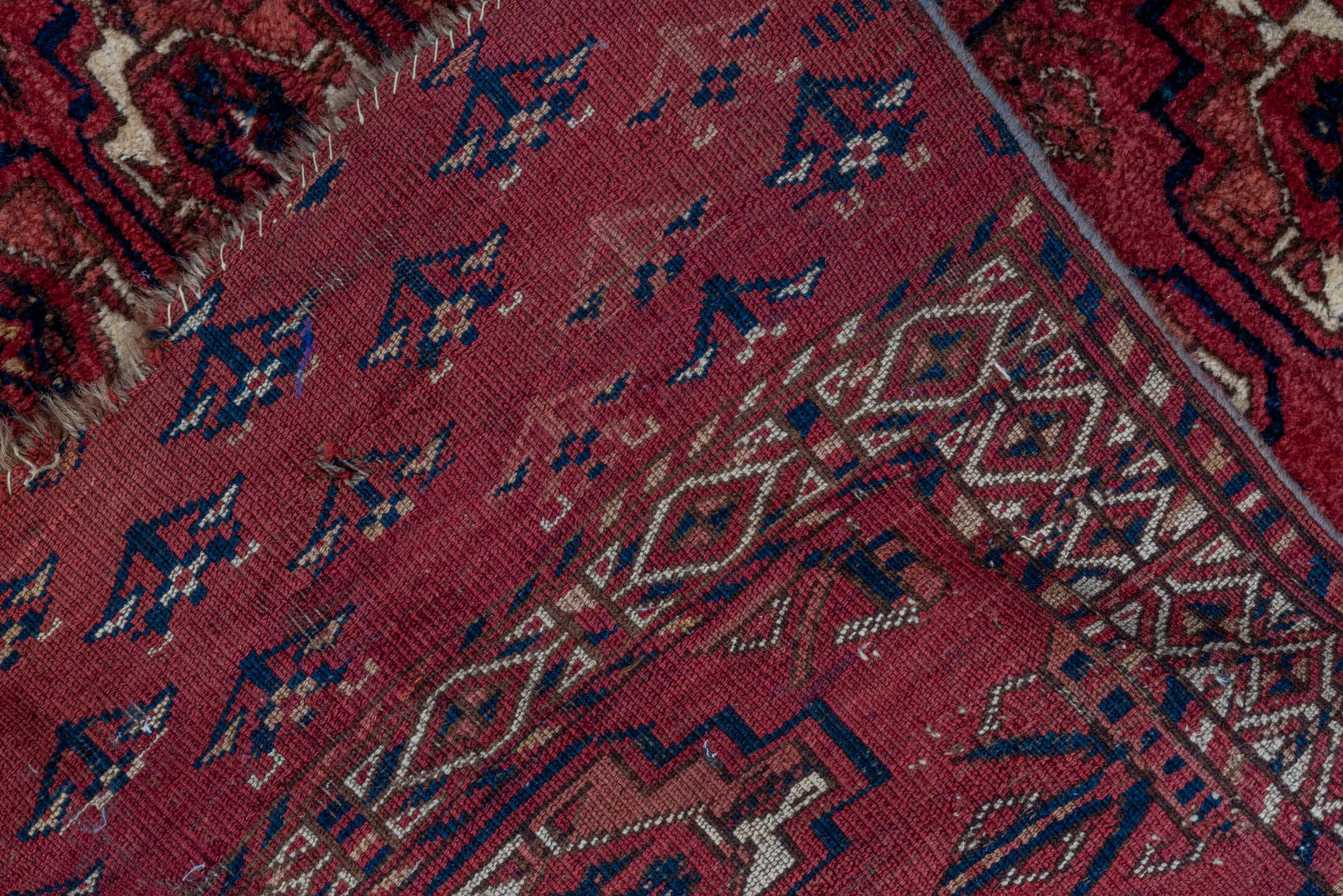 2' x 4' one-of-a-kind handmade vintage Torkaman small size rug. Color palette: red, burgundy, ivory, brown, charcoal, rust