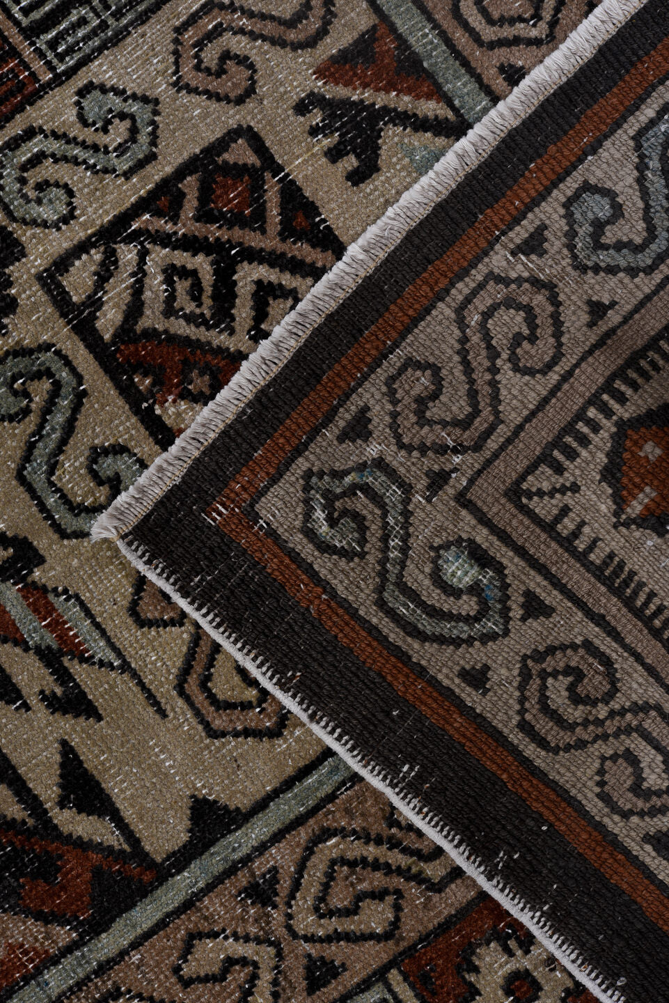 6' x 8' one-of-a-kind handmade vintage Khotan medium size rug. Color palette: black, brown, charcoal, dark gray, gray