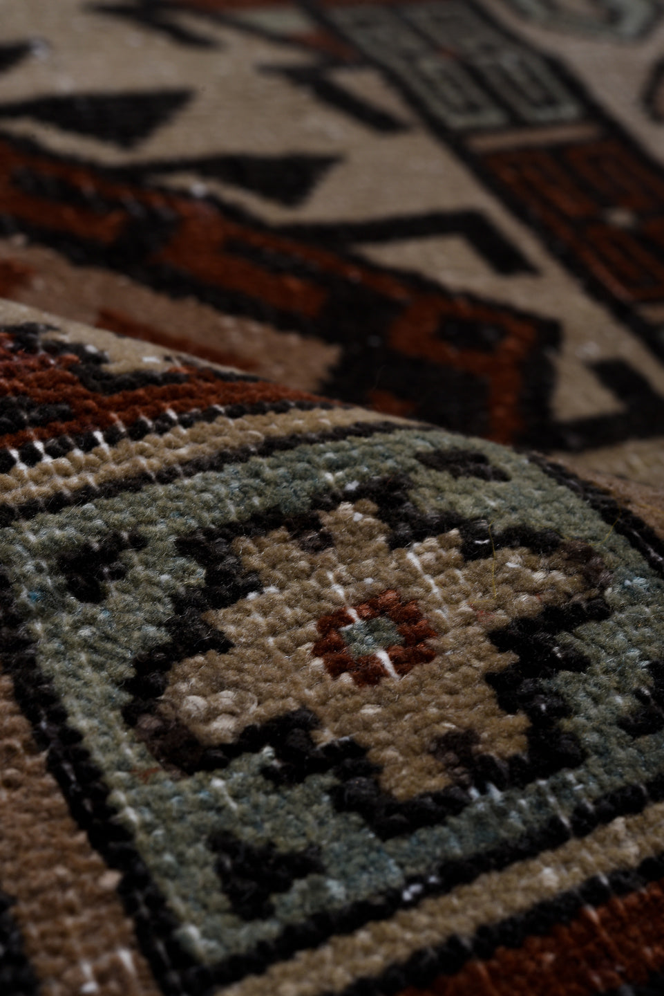 6' x 8' one-of-a-kind handmade vintage Khotan medium size rug. Color palette: black, brown, charcoal, dark gray, gray