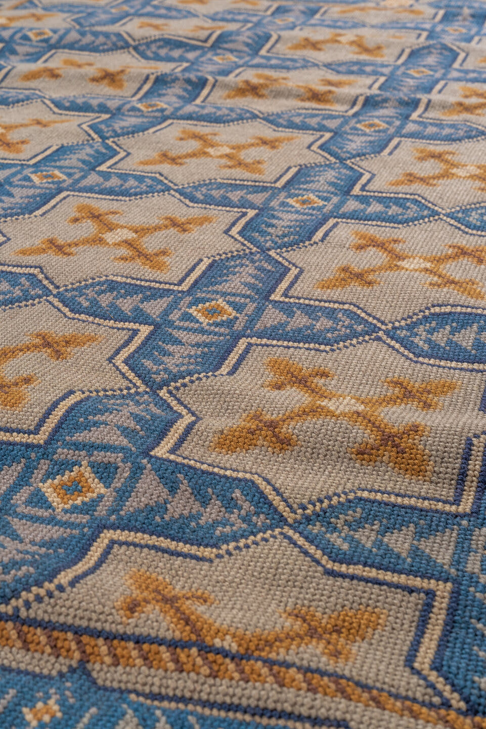 2' x 3' one-of-a-kind handmade vintage Needlepoint small size rug. Color palette: ivory, sky blue, camel, tan, light blue