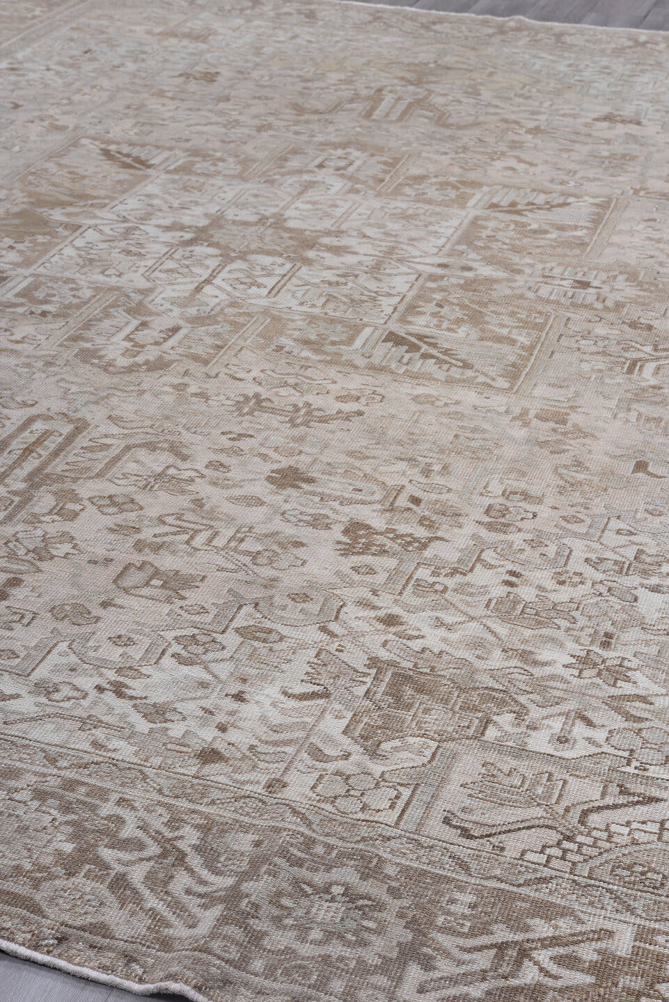 10' x 13' one-of-a-kind handmade antique Heriz large size rug. Color palette: ivory, taupe, beige, camel, sand, light brown