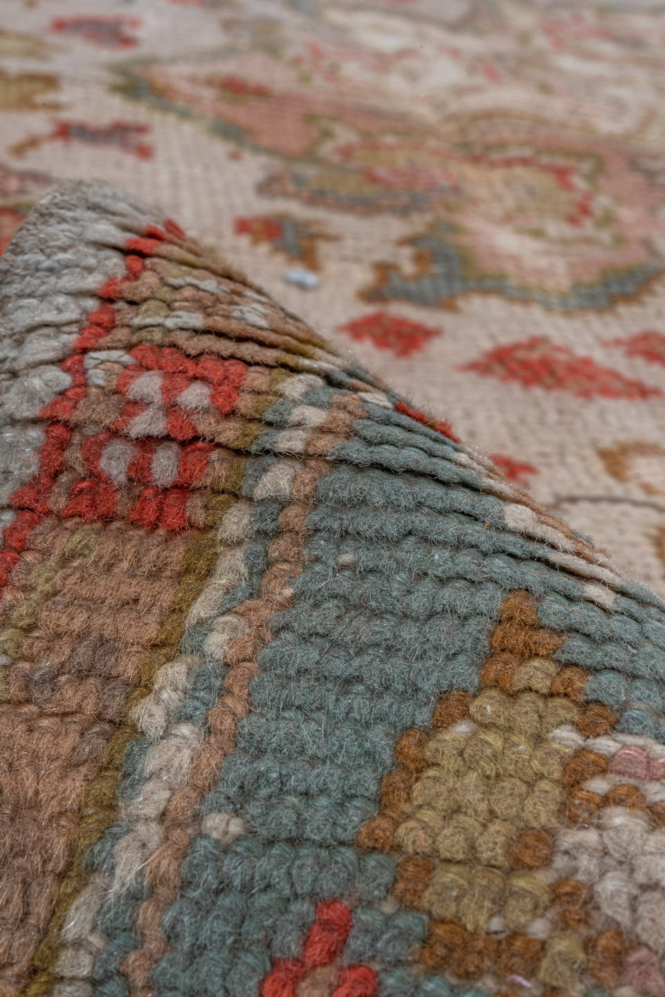 7' x 9' one-of-a-kind handmade antique Oushak rug. Color palette: ivory, powder_blue, coral, taupe, muted_gold, sage