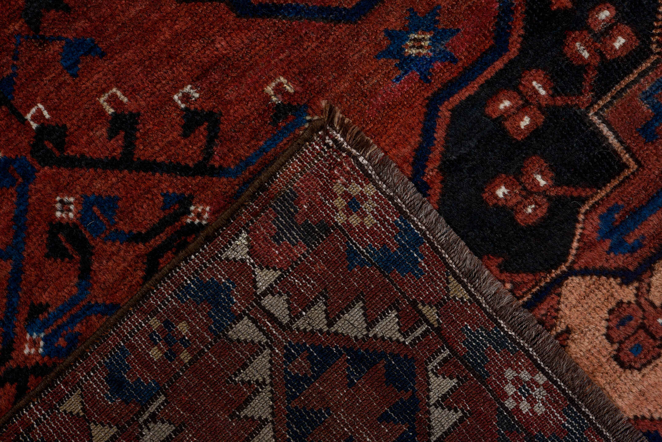 6' x 7' one-of-a-kind handmade vintage Afghan rug. Color palette: black, brown, gray, light gray, off-white, pink, red