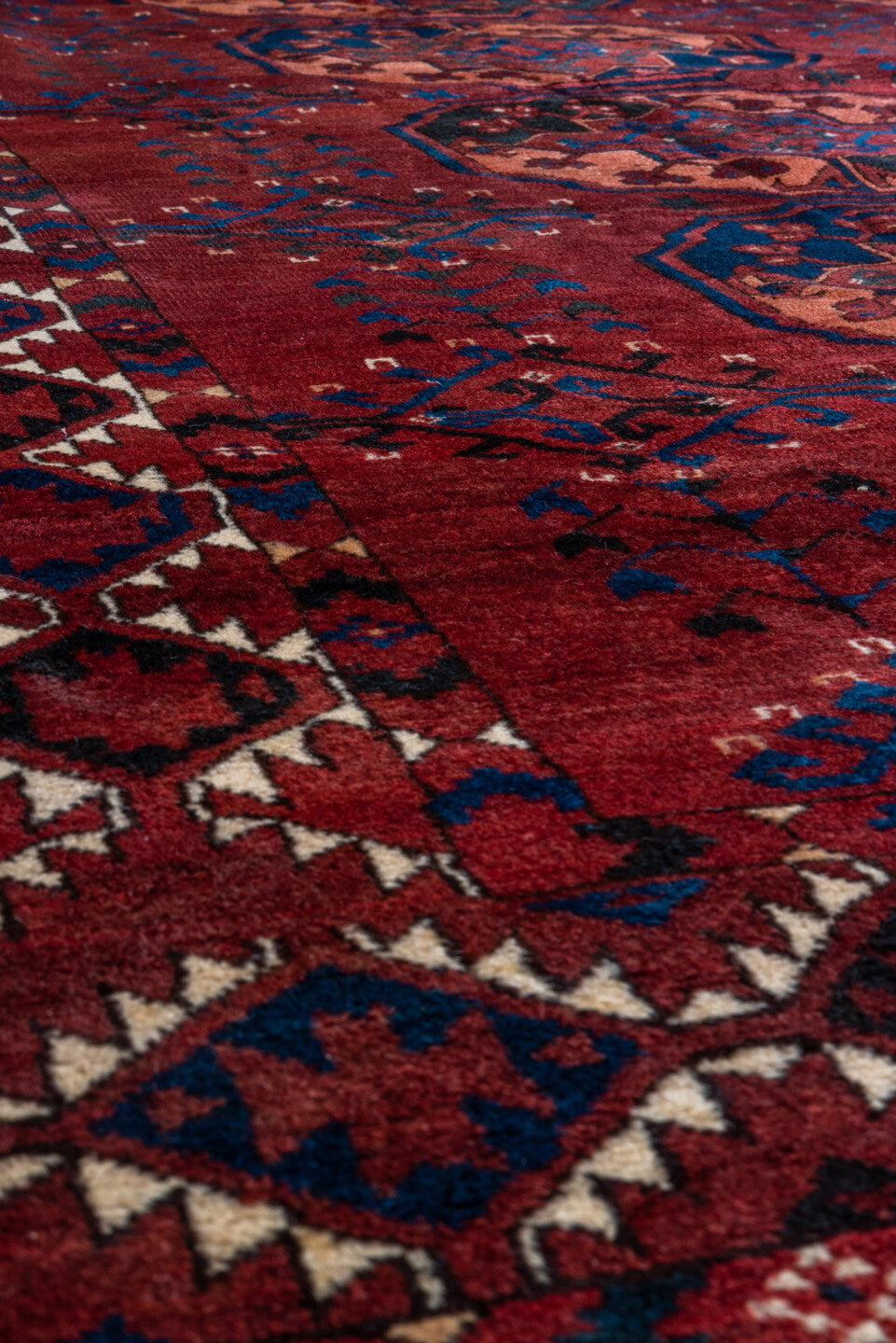 6' x 7' one-of-a-kind handmade vintage Afghan rug. Color palette: black, brown, gray, light gray, off-white, pink, red