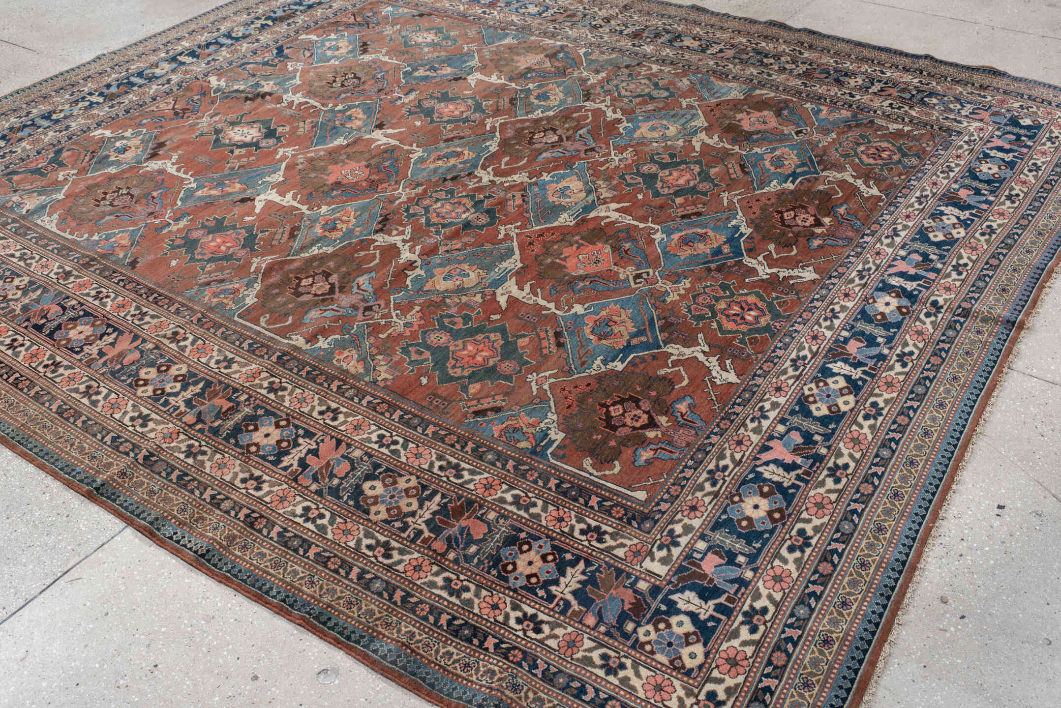 9' x 10' one-of-a-kind handmade antique Bakhshayesh large size rug. Color palette: terra cotta, navy, ivory, sky blue, camel