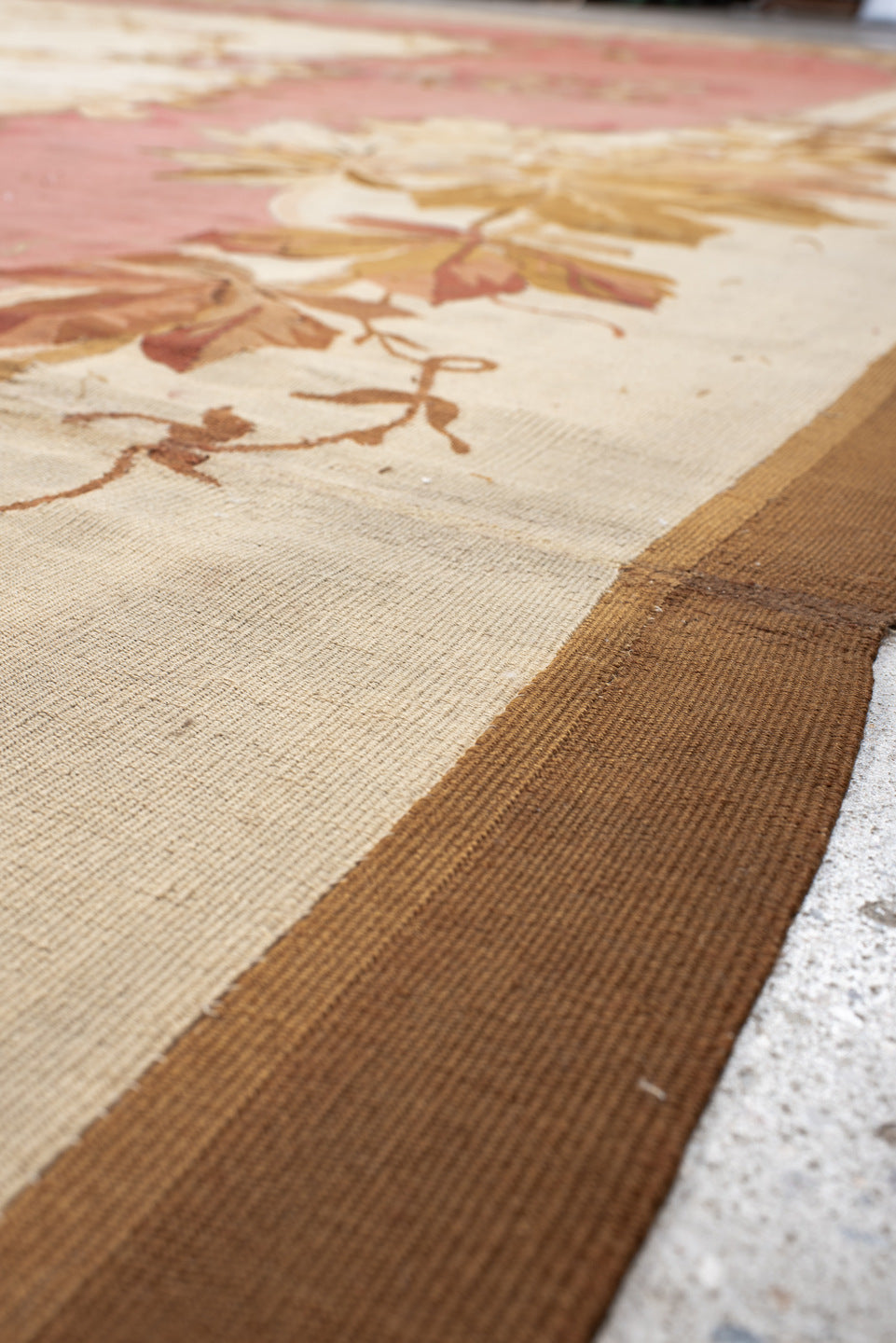18' x 18' one-of-a-kind handmade antique Aubusson oversize rug. Color palette: rose, ivory, taupe, camel, blush, burgundy