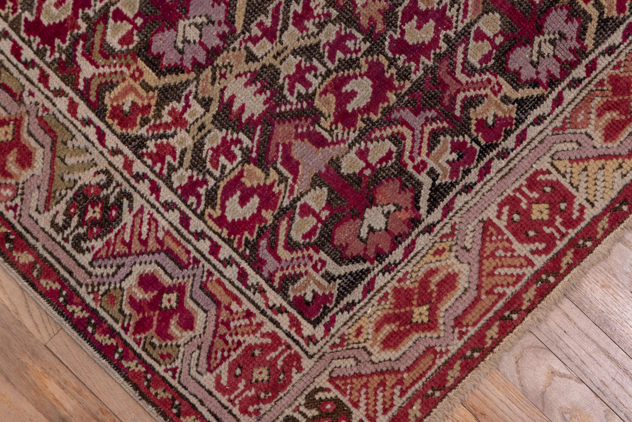 6' x 11' one-of-a-kind handmade vintage Ghordes large size rug. Color palette: brown, gray, off-white, pink, red, snow