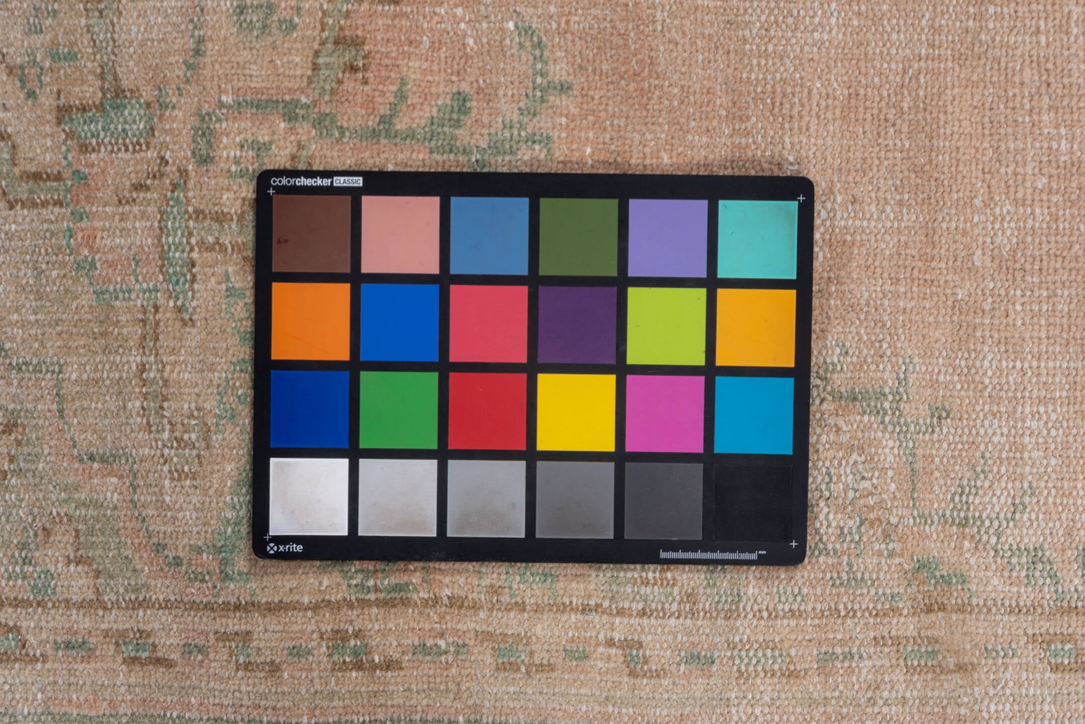 5' x 9' one-of-a-kind handmade vintage Sparta medium size rug. Color palette: brown, gray, light gray, off-white, pink, snow