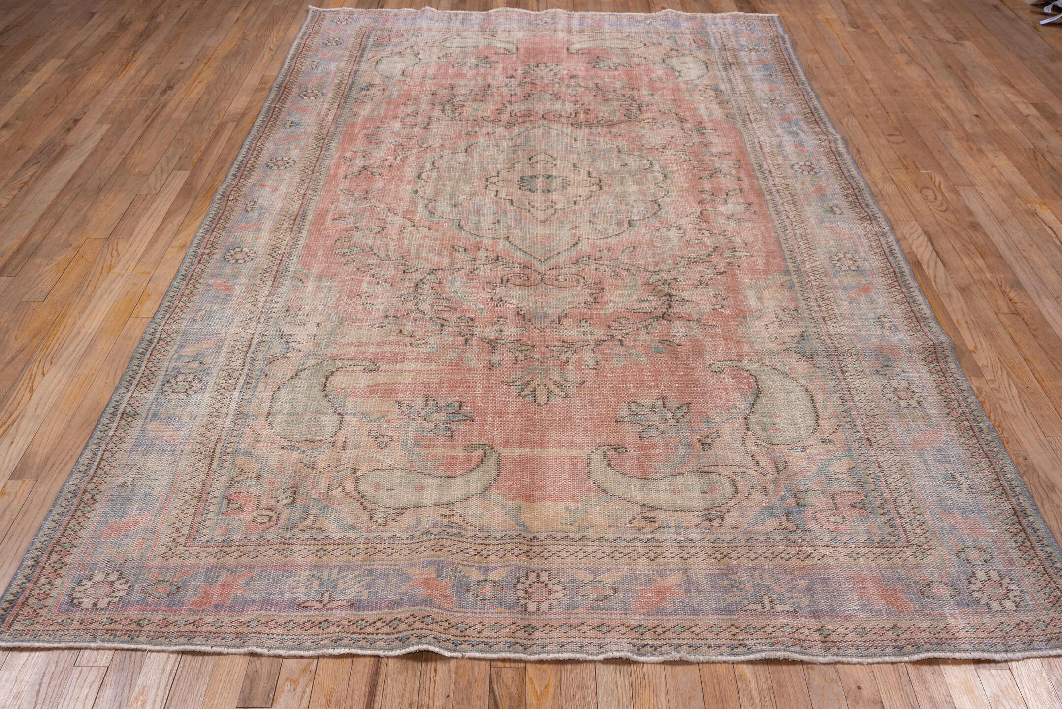 6' x 10' one-of-a-kind handmade vintage Sparta large size rug. Color palette: blush, pale blue, ivory, taupe, sage
