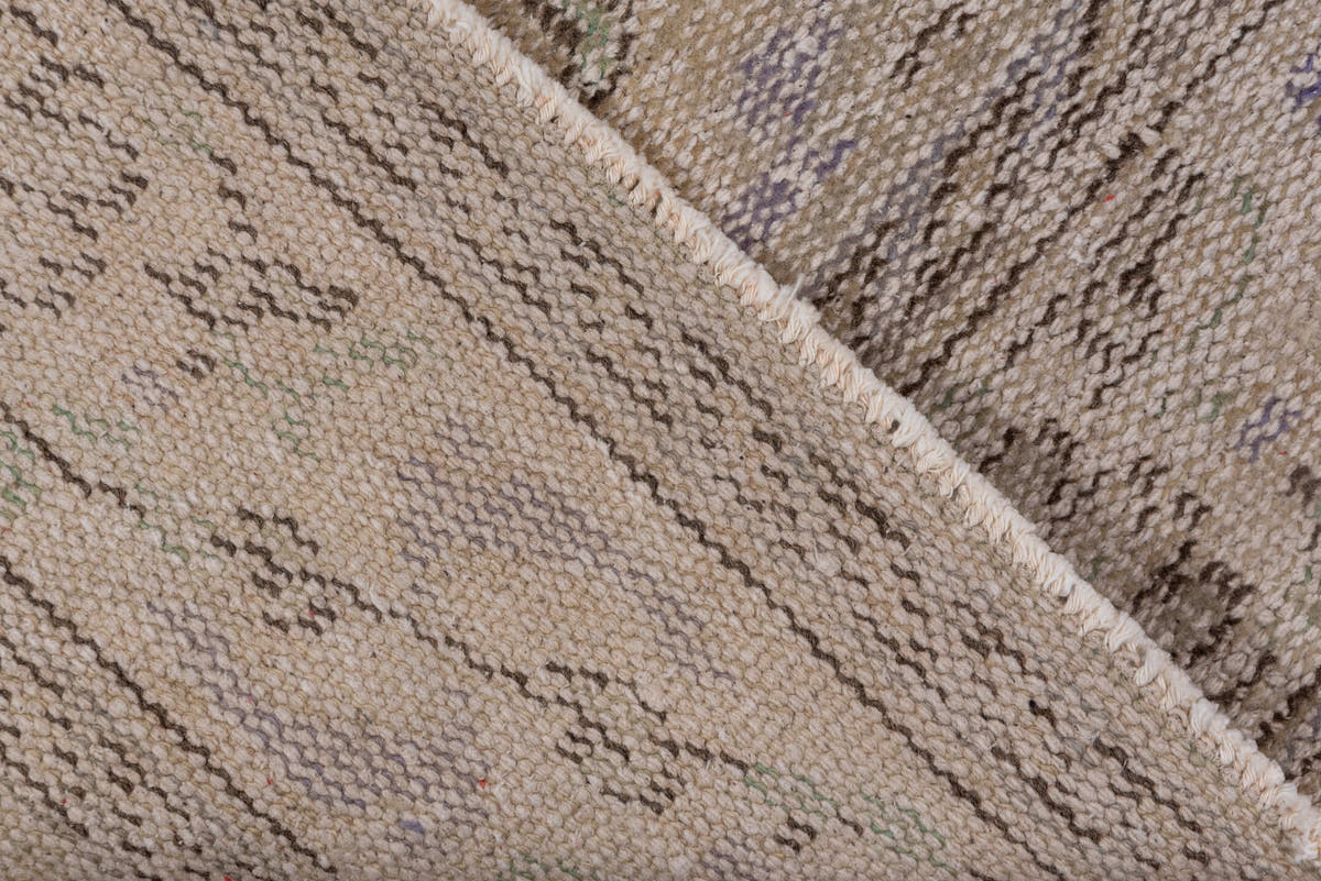 6' x 9' one-of-a-kind handmade vintage Sparta medium size rug. Color palette: taupe, beige, ivory, lavender, sage, brown