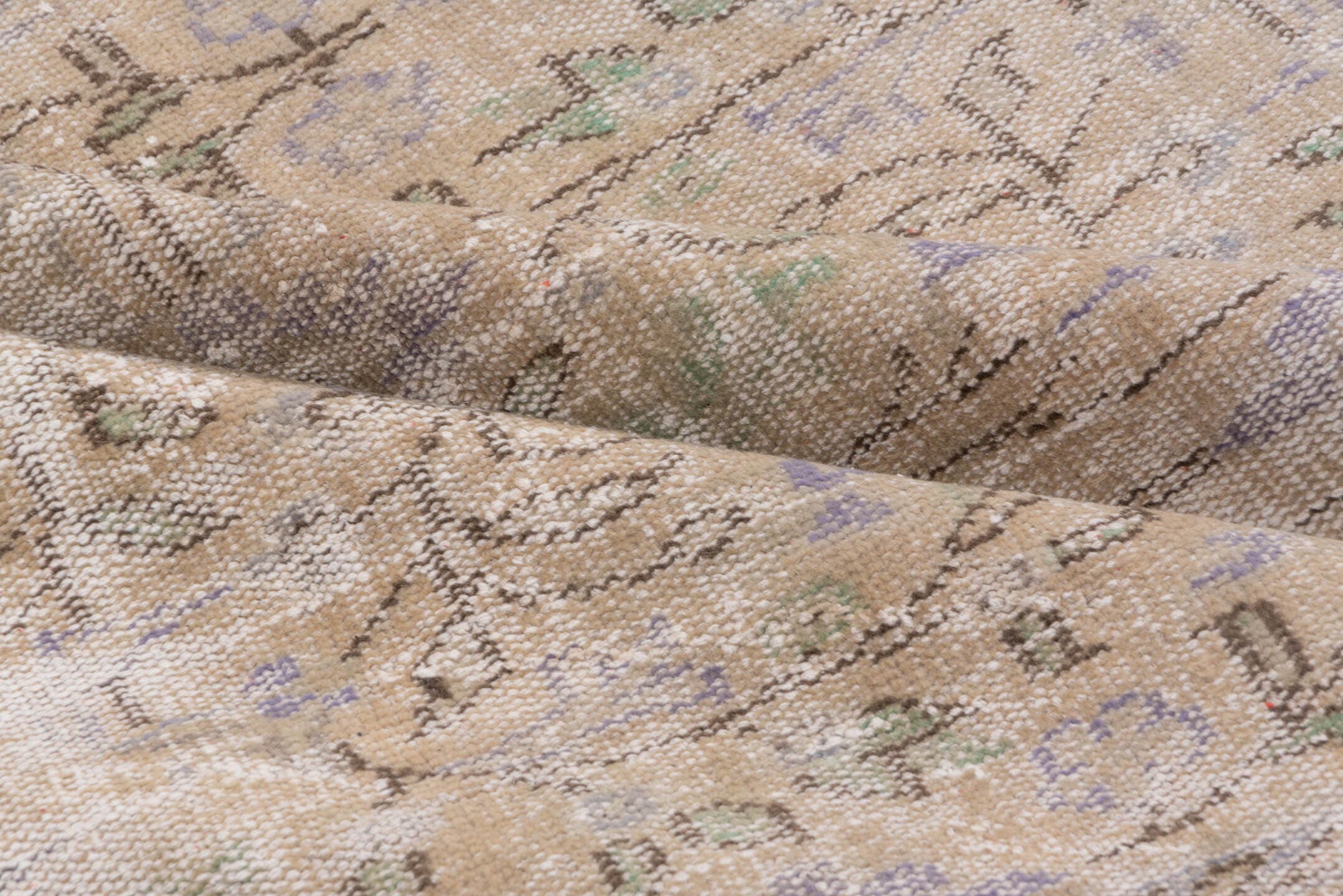 6' x 9' one-of-a-kind handmade vintage Sparta medium size rug. Color palette: taupe, beige, ivory, lavender, sage, brown