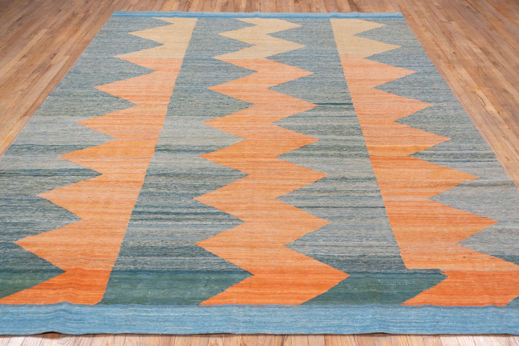 8' x 11' one-of-a-kind handmade vintage Kilim large size rug. Color palette: blue, peach, sky_blue, sand, slate, teal