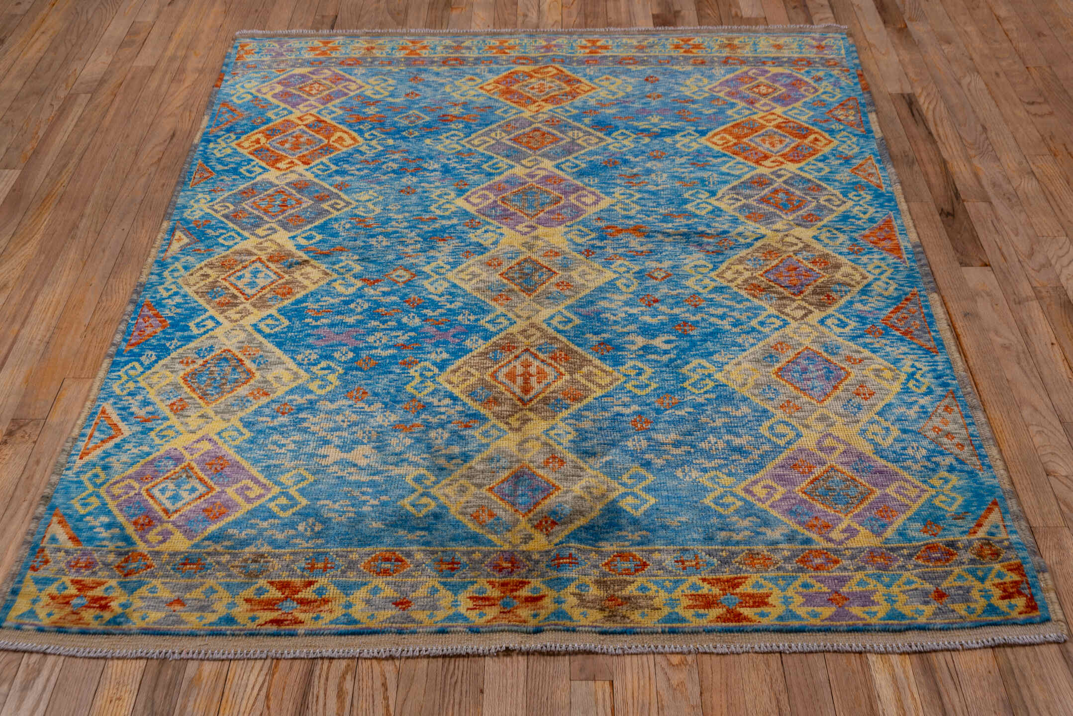 5' x 6' one-of-a-kind handmade vintage Gabbe rug. Color palette: sky blue, ivory, rust, gold, lavender, taupe, slate