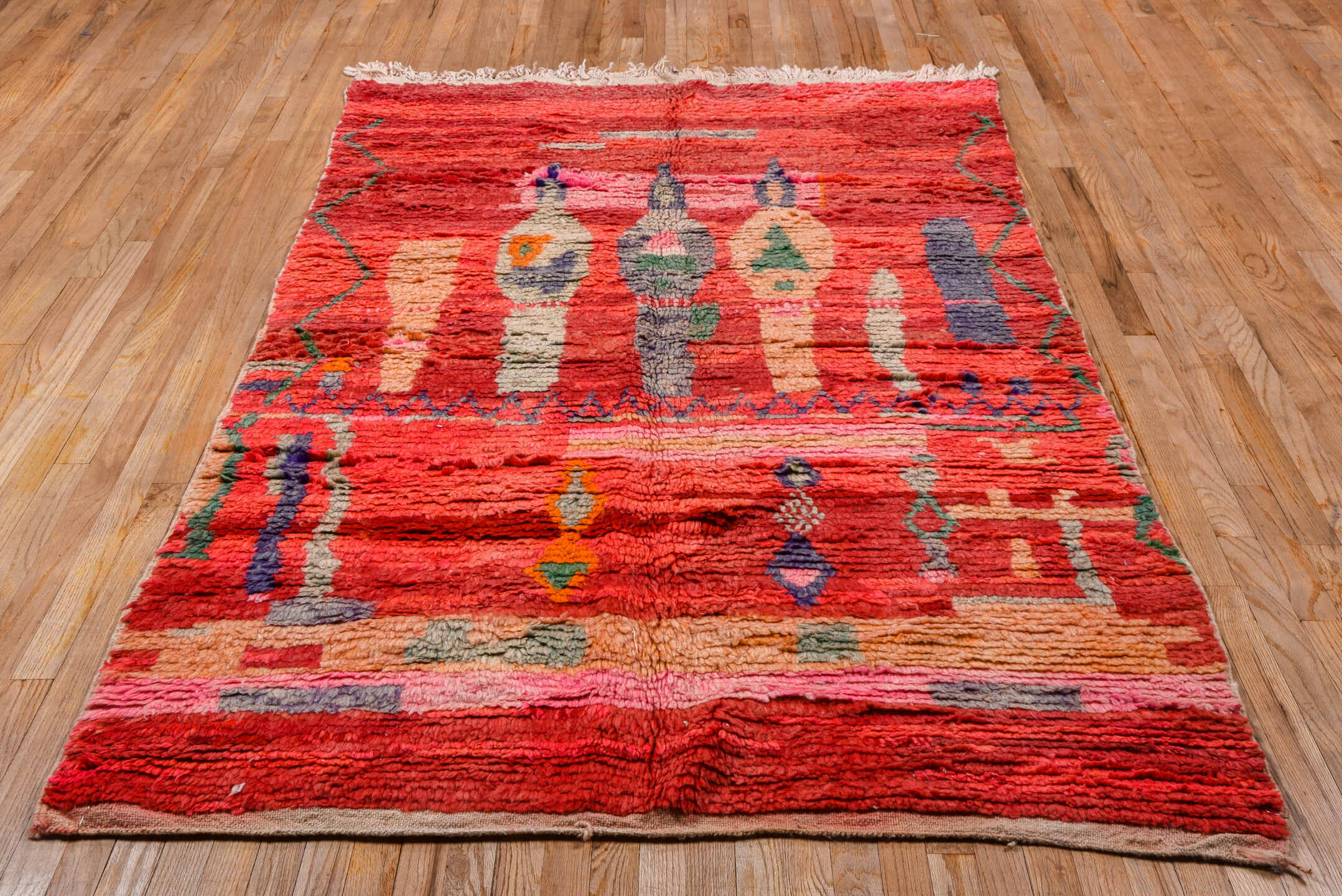 5' x 7' one-of-a-kind handmade vintage Moroccan rug. Color palette: coral, red, crimson, peach, pink, ivory, sage, lavender