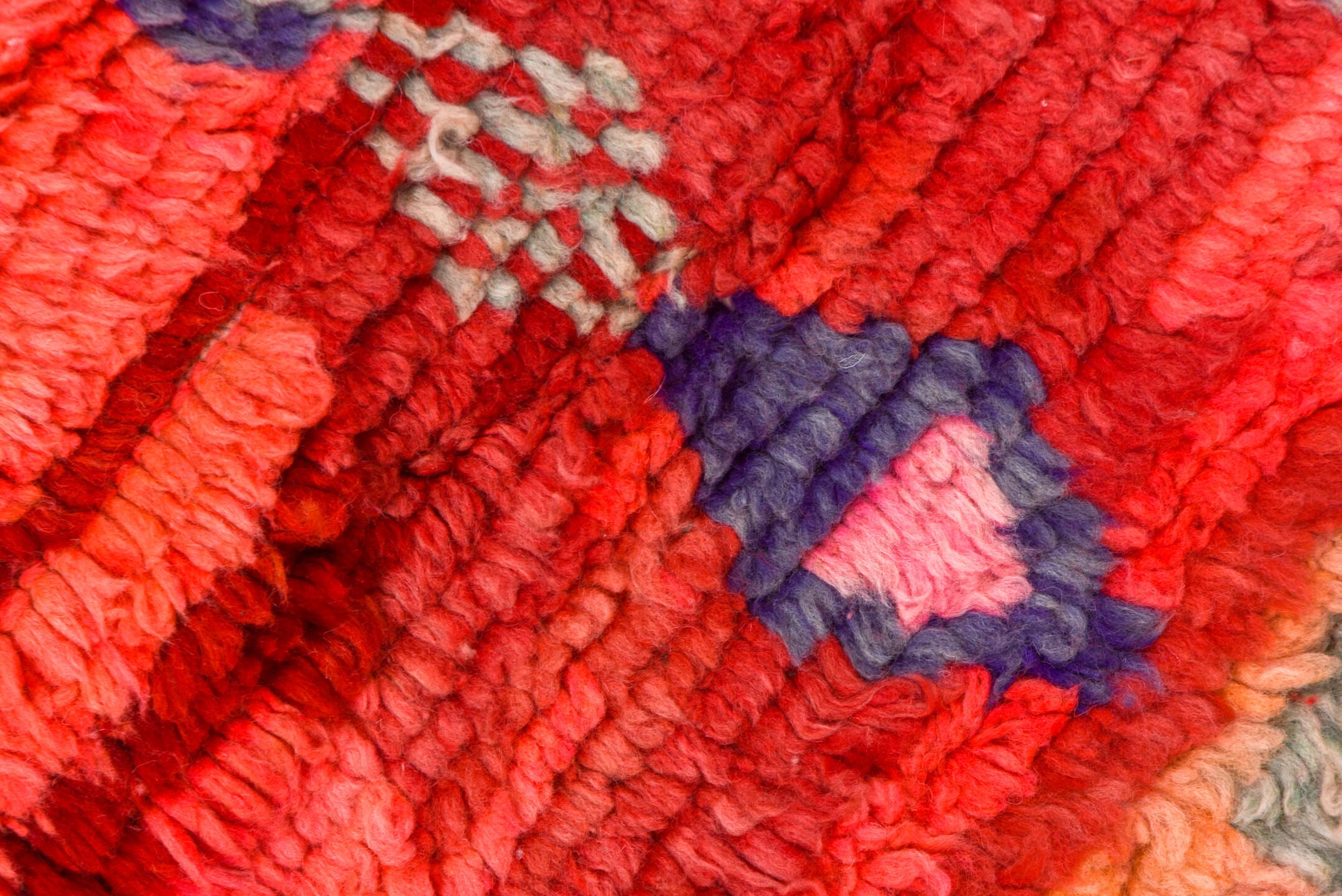 5' x 7' one-of-a-kind handmade vintage Moroccan rug. Color palette: coral, red, crimson, peach, pink, ivory, sage, lavender