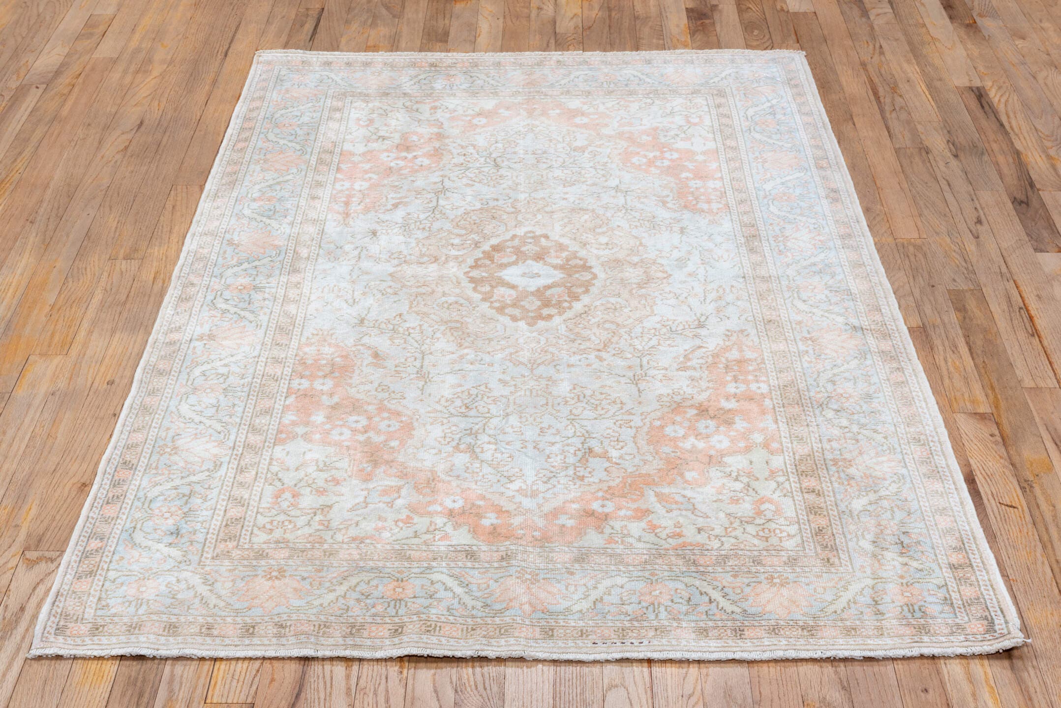 3' x 6' one-of-a-kind handmade antique Kaisary small size rug. Color palette: ivory, blush, peach, pale blue, taupe, beige