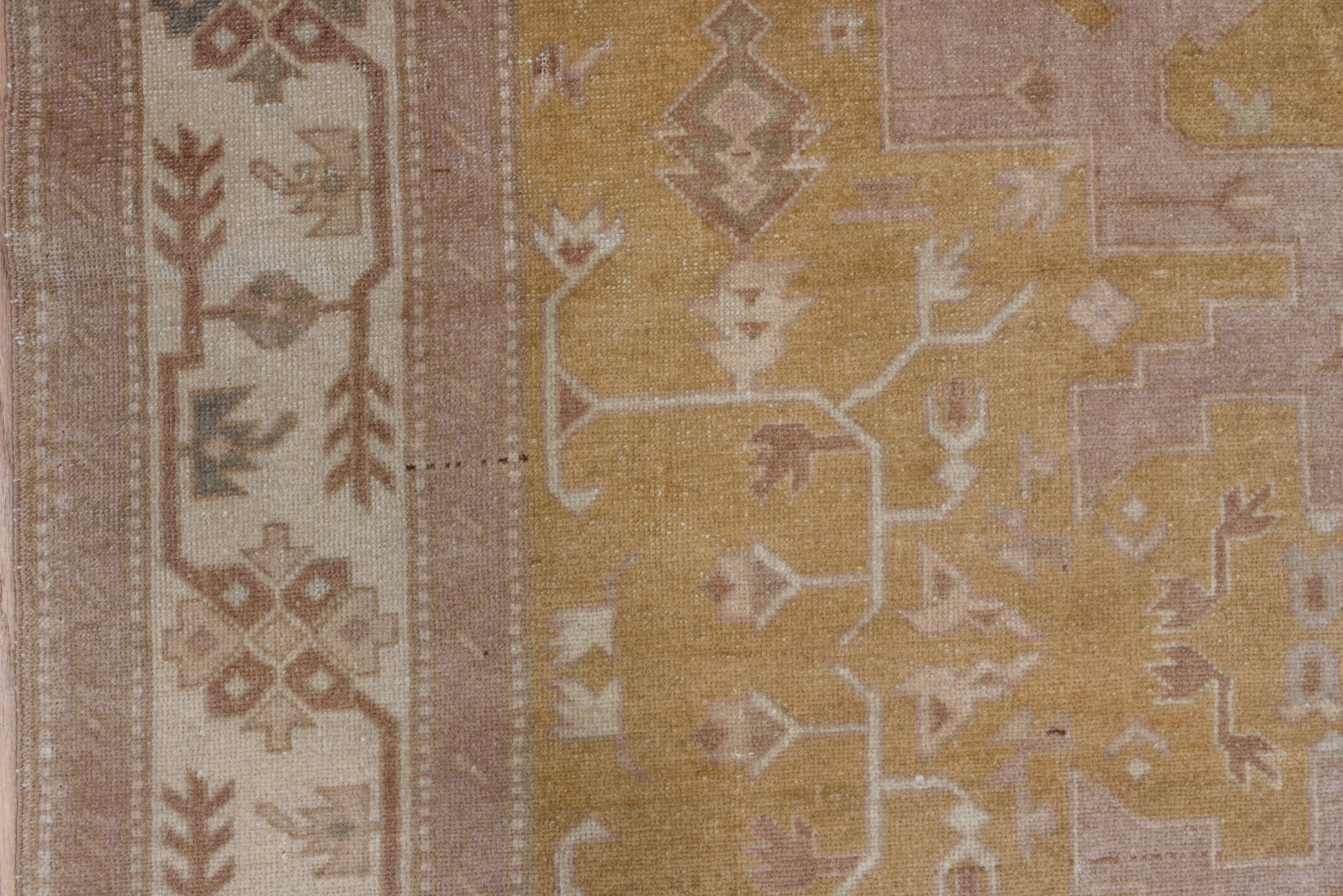 5' x 8' one-of-a-kind handmade vintage Caucasian medium size rug. Color palette: brown, gray, light gray, off-white, orange