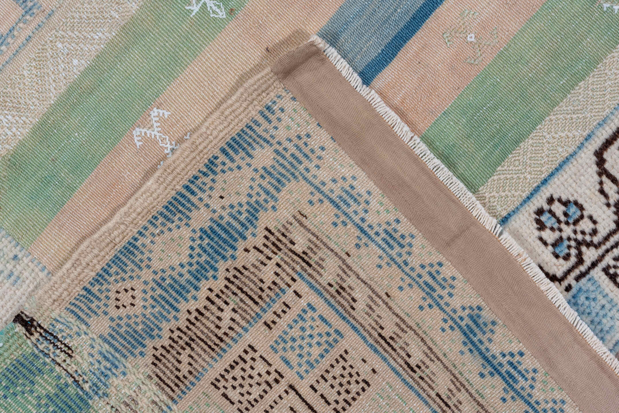 6' x 9' one-of-a-kind handmade antique Moroccan medium size rug. Color palette: ivory, pale blue, sage, blush, taupe, brown