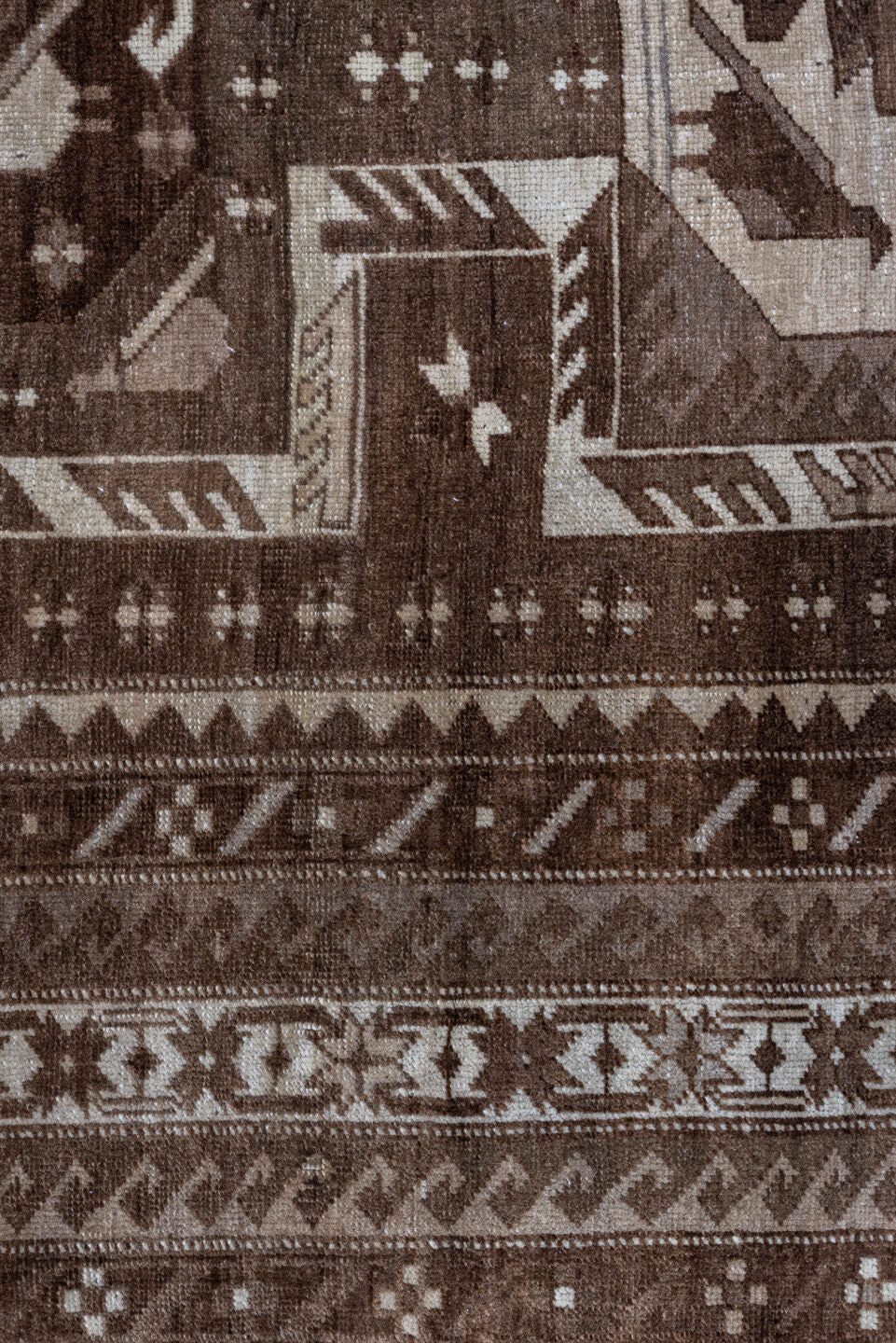 5' x 7' one-of-a-kind handmade vintage Kars rug. Color palette: brown, gray, pink