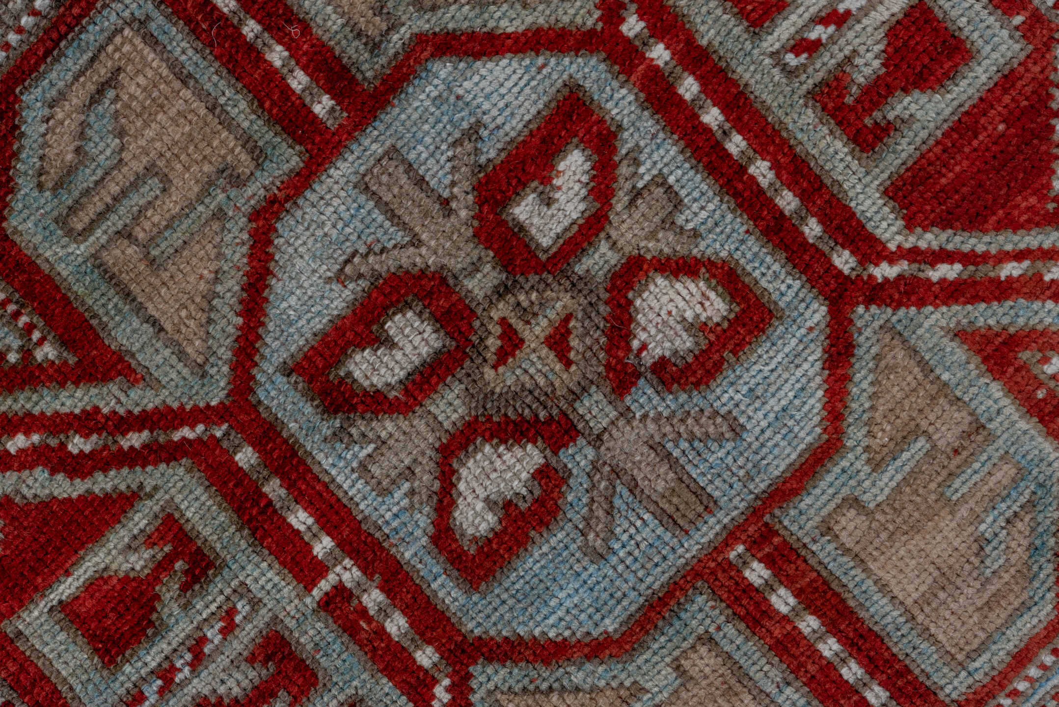 4' x 7' one-of-a-kind handmade antique Kazak rug. Color palette: rust, ivory, sky blue, taupe, brick, camel, terracotta