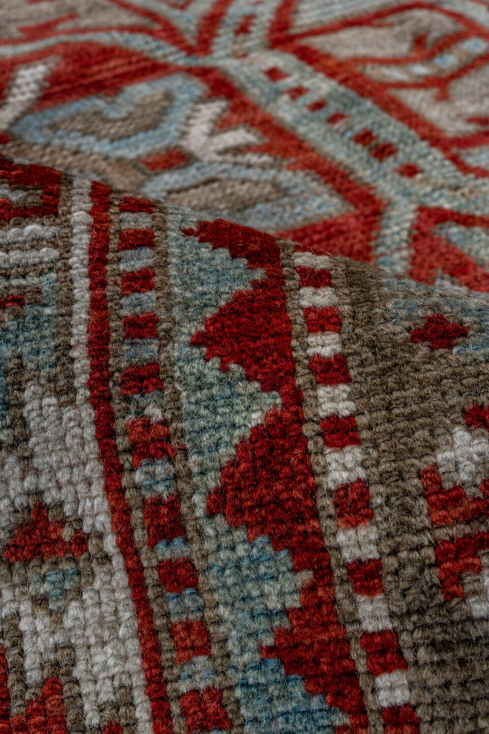4' x 7' one-of-a-kind handmade antique Kazak rug. Color palette: rust, ivory, sky blue, taupe, brick, camel, terracotta