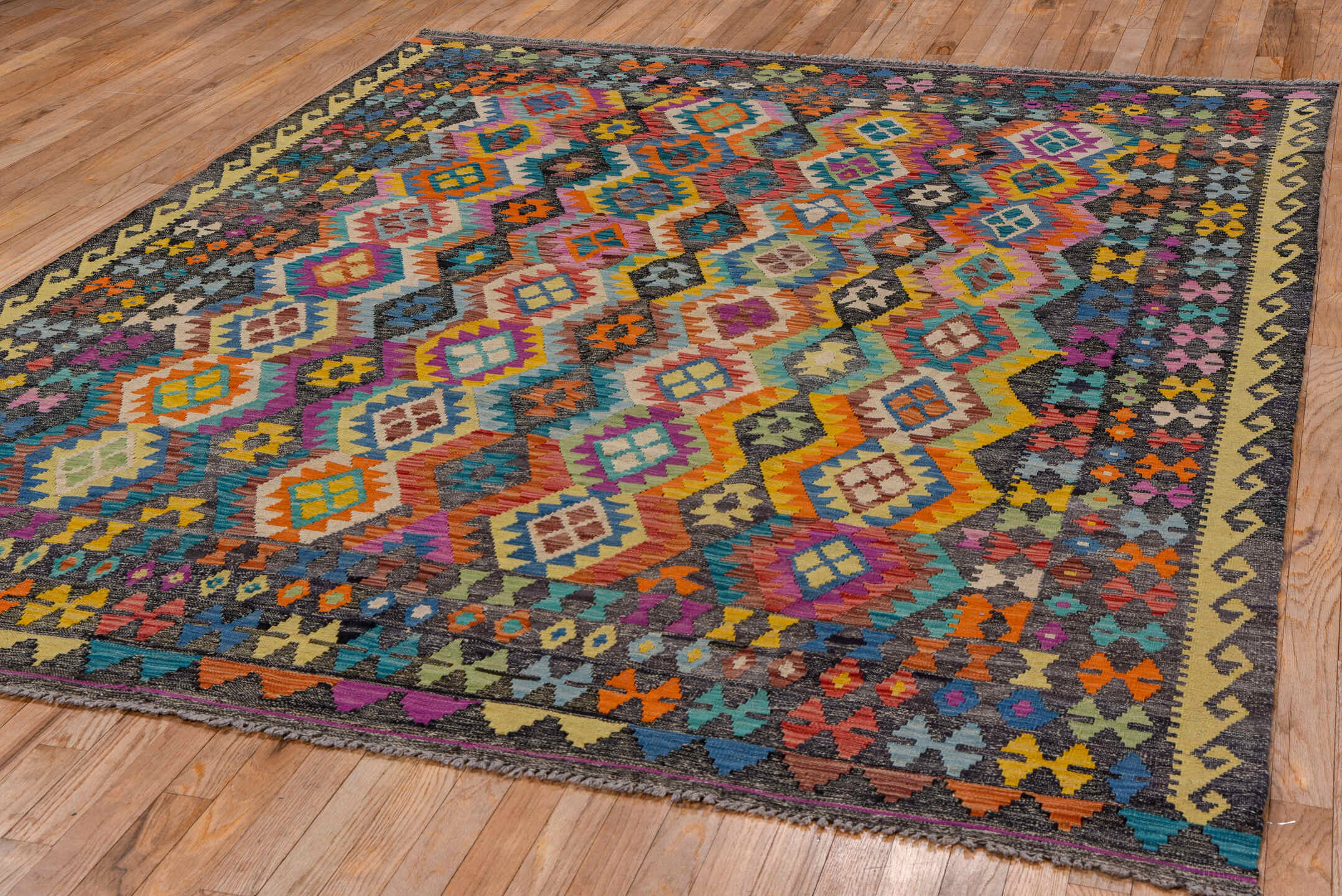 6' x 9' one-of-a-kind handmade vintage Kilim medium size rug. Color palette: gray, ivory, turquoise, orange, magenta, blue