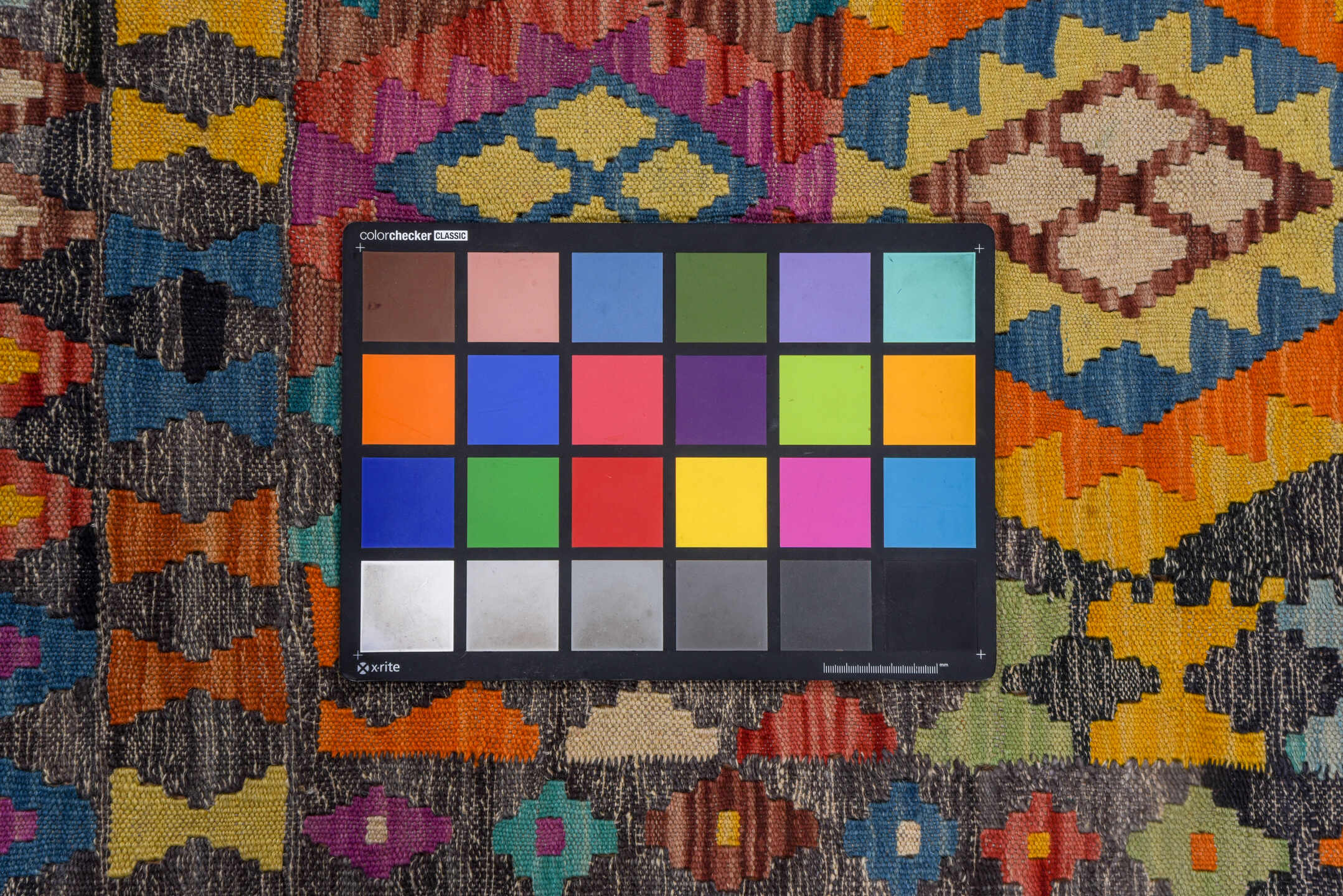 6' x 9' one-of-a-kind handmade vintage Kilim medium size rug. Color palette: gray, ivory, turquoise, orange, magenta, blue
