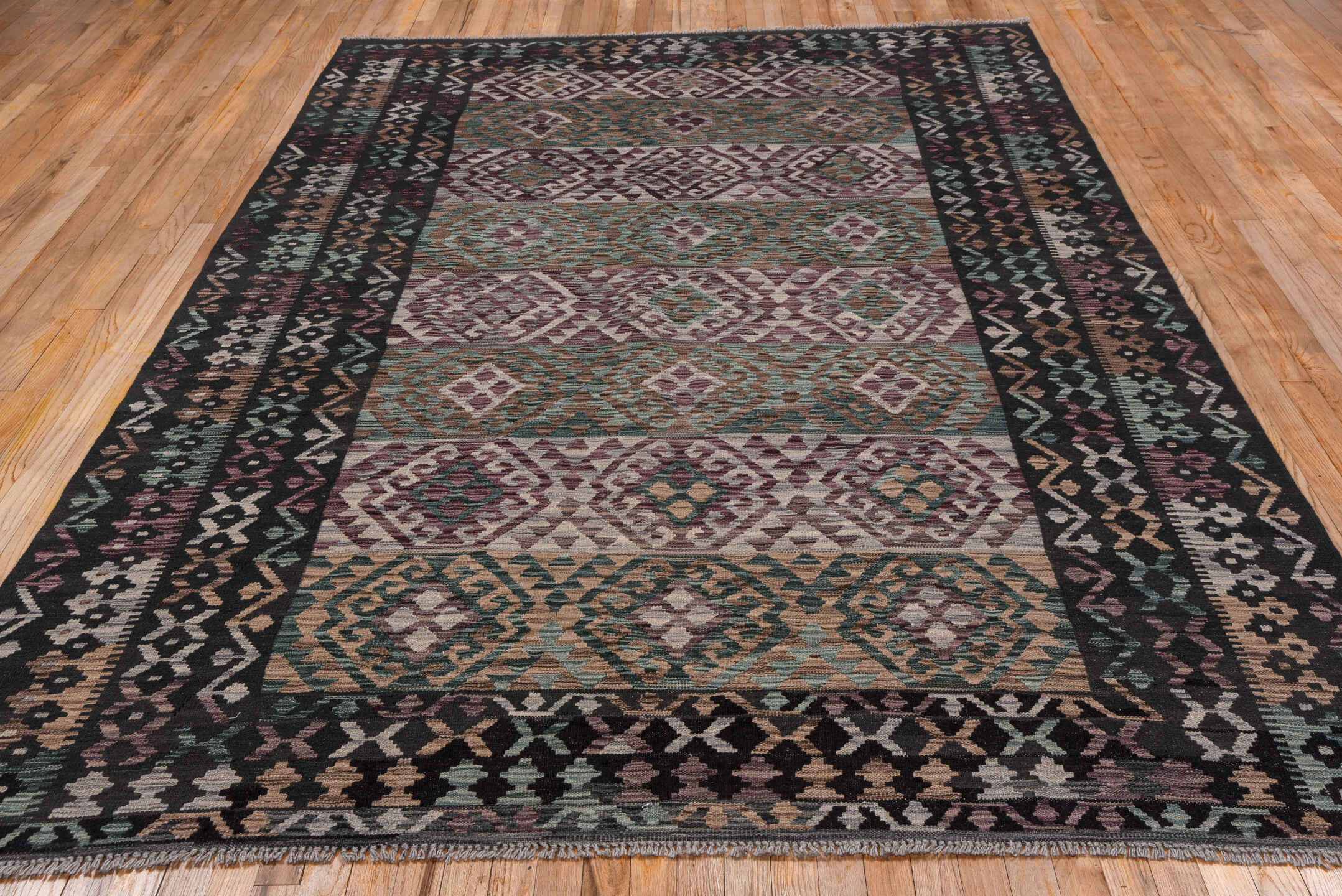 6' x 10' one-of-a-kind handmade vintage Kilim large size rug. Color palette: charcoal, mauve, taupe, teal, ivory, dusty_rose
