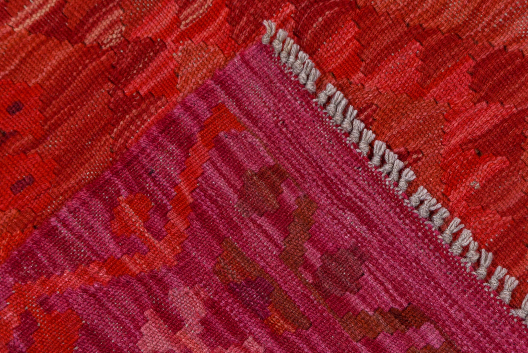 5' x 8' one-of-a-kind handmade vintage Kilim medium size rug. Color palette: magenta, crimson, fuchsia, rose, burgundy