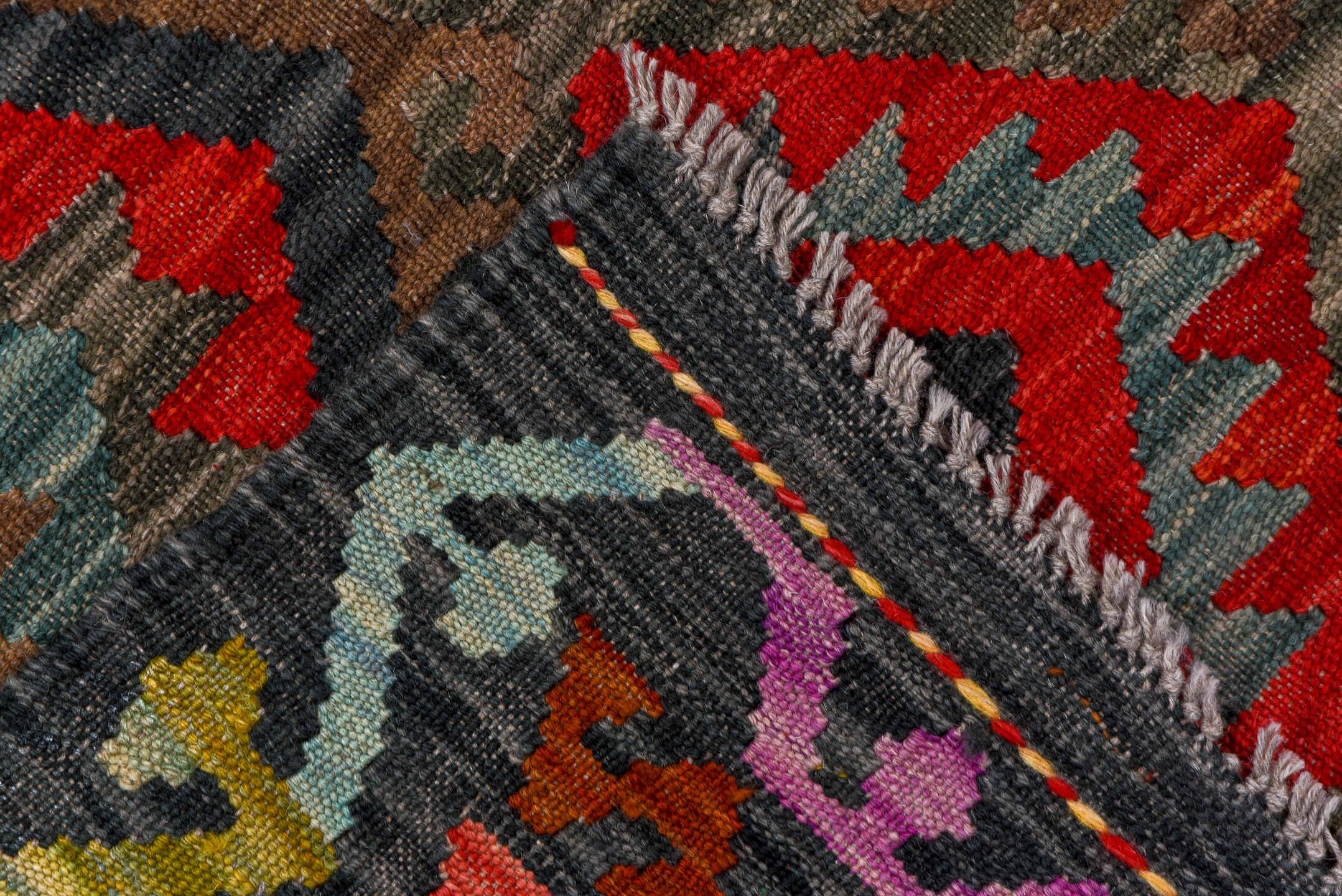 7' x 9' one-of-a-kind handmade vintage Kilim rug. Color palette: aqua, charcoal, crimson, taupe, coral, lavender, ivory