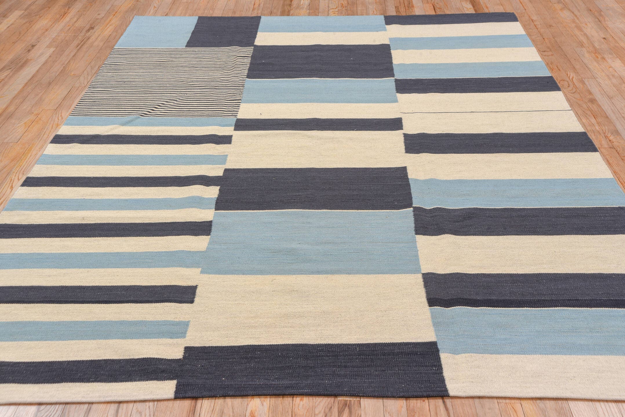 7' x 9' one-of-a-kind handmade vintage Kilim rug. Color palette: ivory, navy, sky blue, blue, light blue