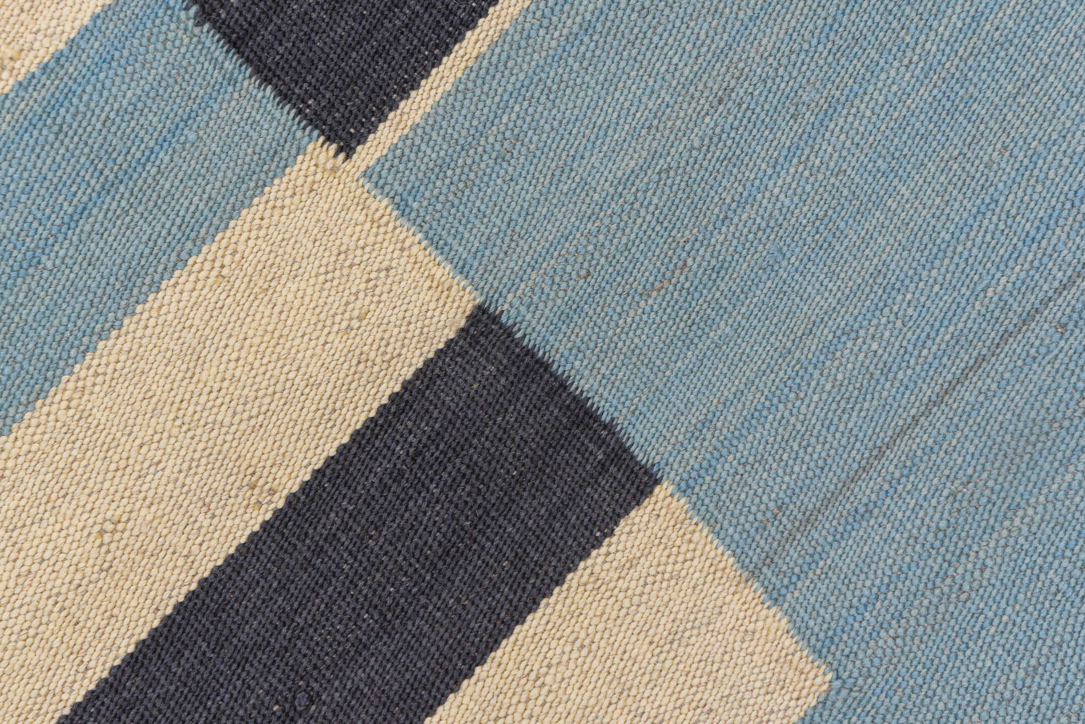 7' x 9' one-of-a-kind handmade vintage Kilim rug. Color palette: black, blue, brown, charcoal, dark gray, gray, light blue