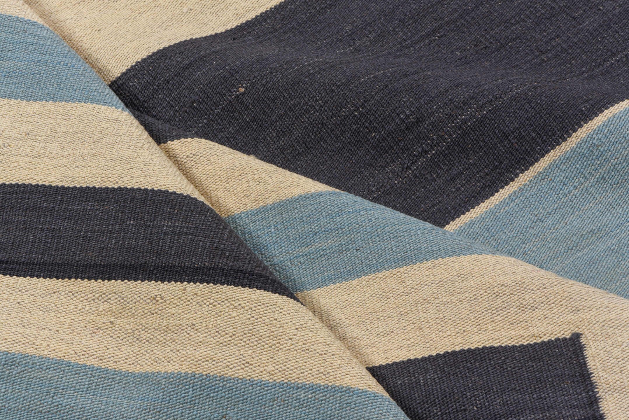 7' x 9' one-of-a-kind handmade vintage Kilim rug. Color palette: black, blue, brown, charcoal, dark gray, gray, light blue