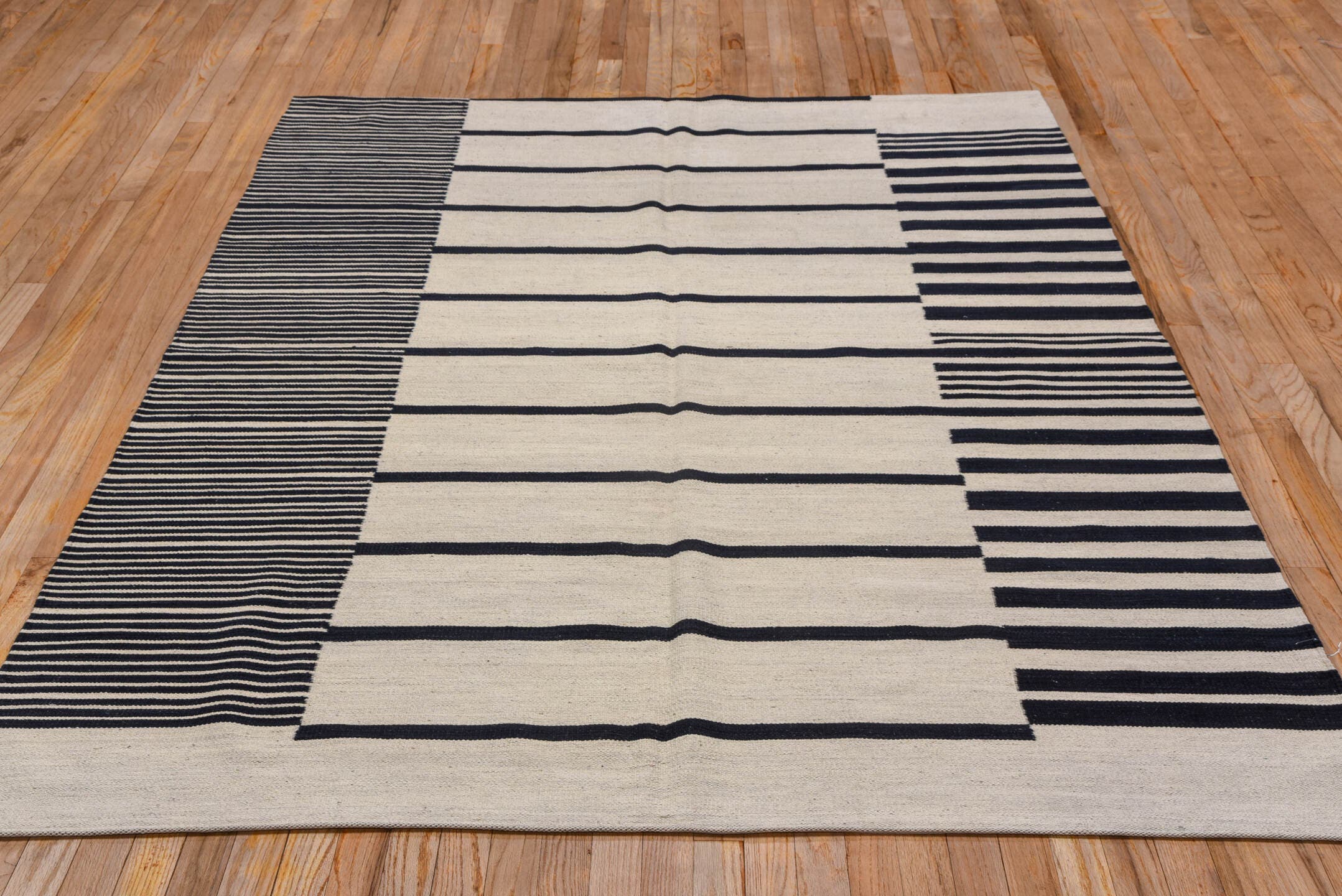 5' x 8' one-of-a-kind handmade vintage Kilim medium size rug. Color palette: ivory, charcoal, gray, black