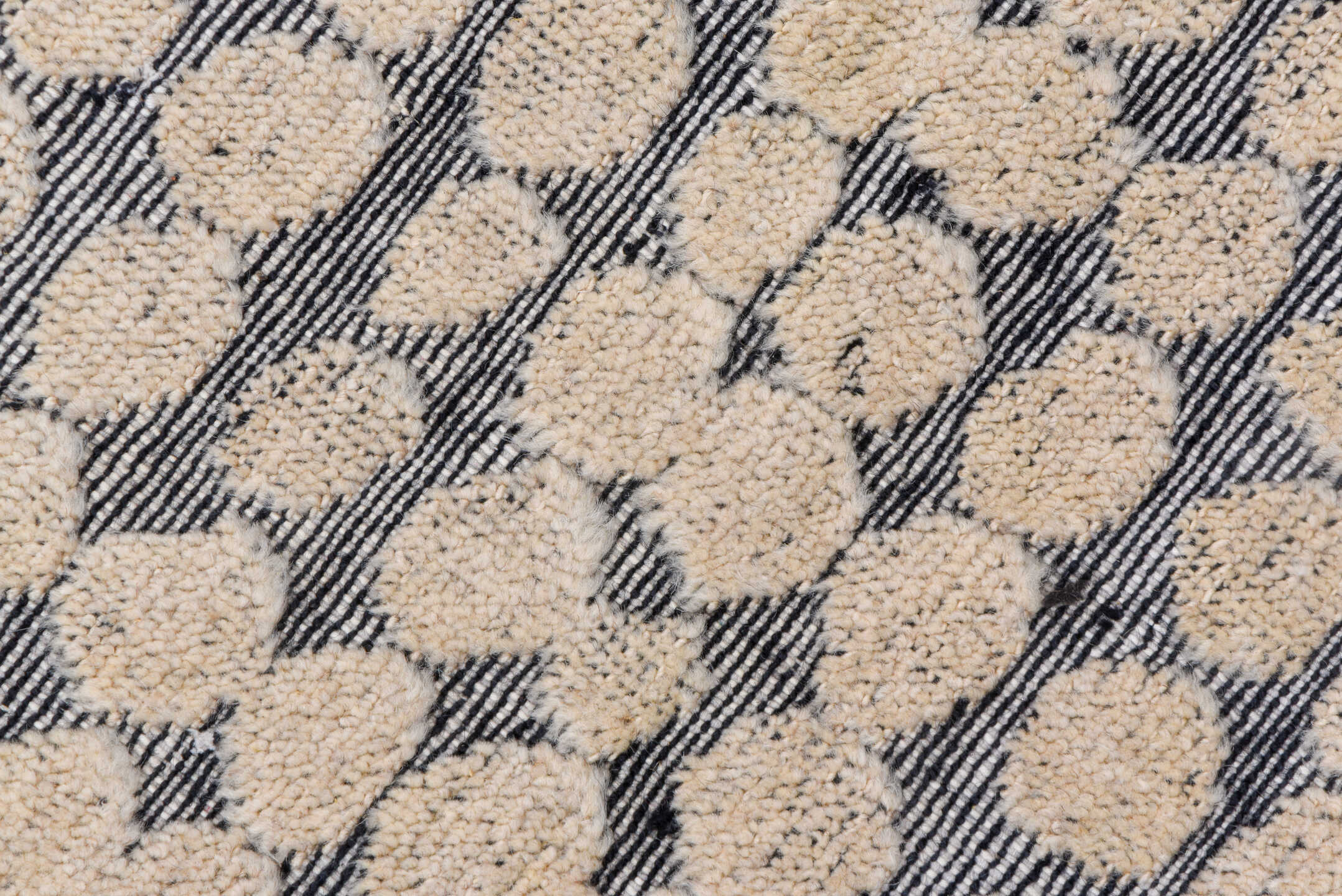 5' x 8' one-of-a-kind handmade handmade Modern medium size rug. Color palette: ivory, slate, gray, charcoal, black
