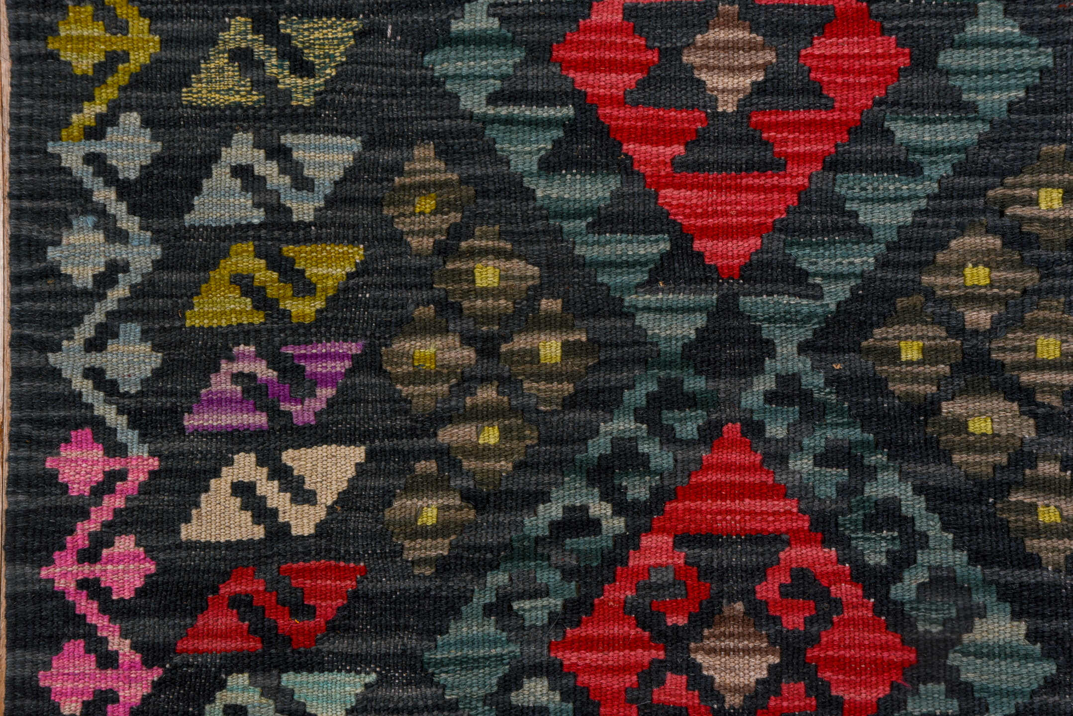 2' x 8' one-of-a-kind handmade vintage Kilim runner rug. Color palette: charcoal, teal, crimson, saffron, ivory, pink, taupe
